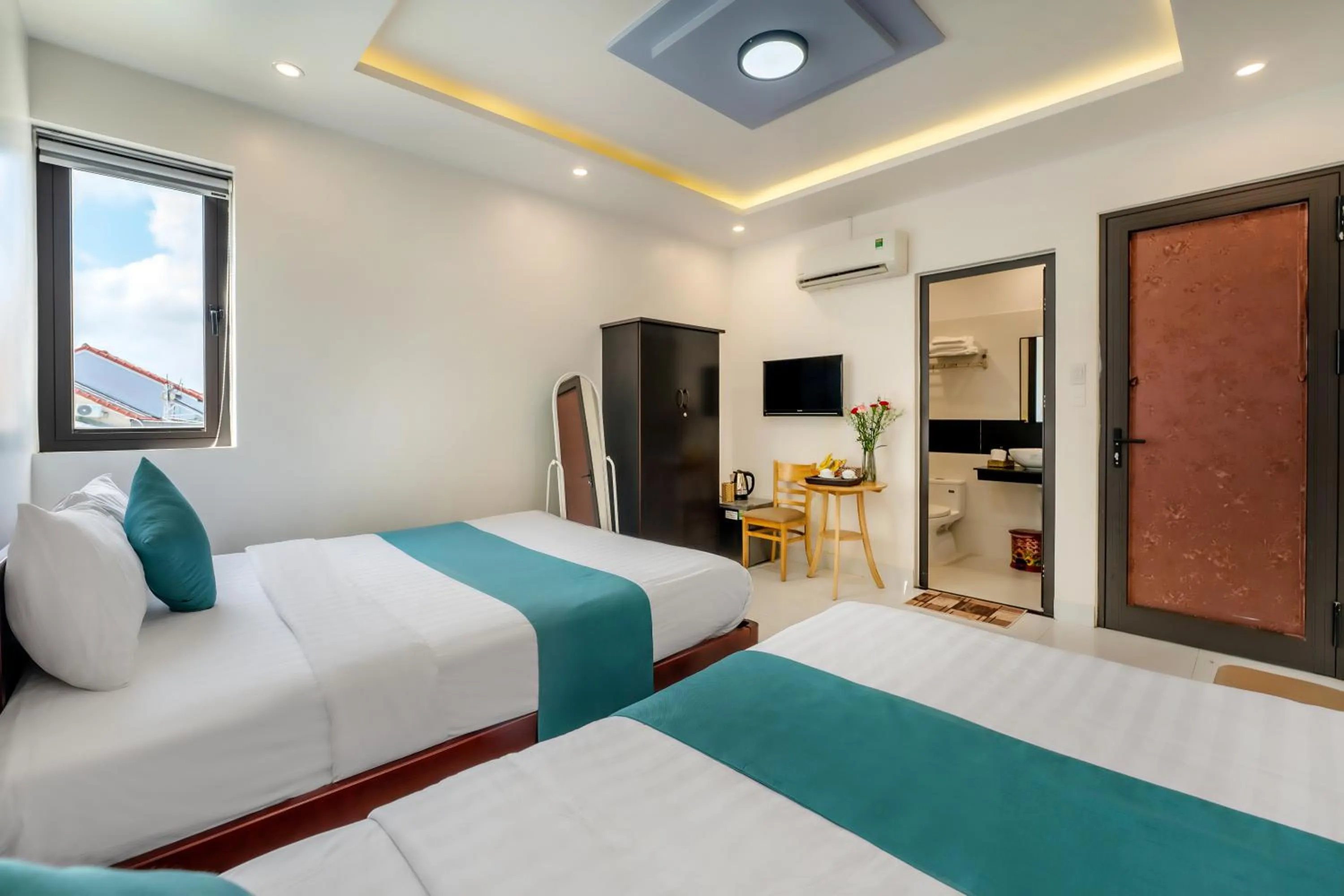 Communal lounge/ TV room, Bed in Rockmouse Centre River Villa Hoi An