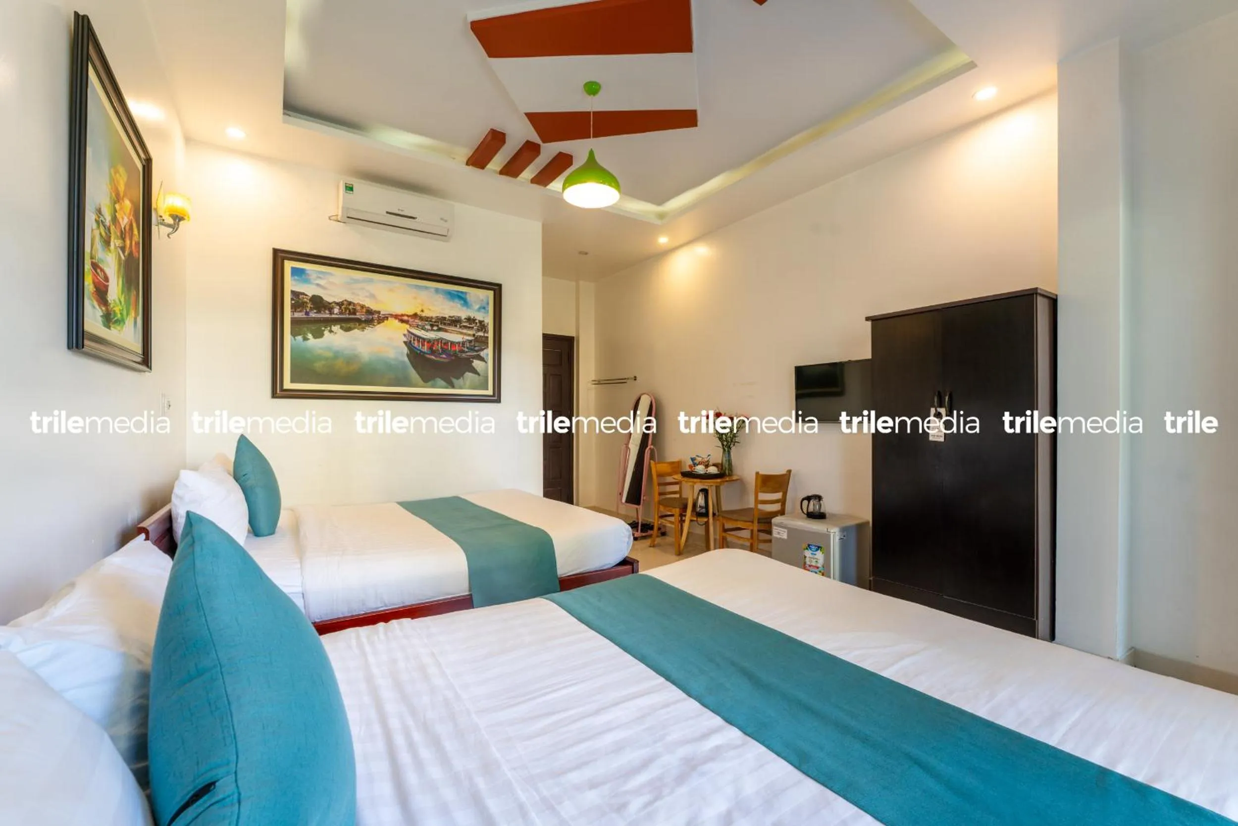 Communal lounge/ TV room, Bed in Rockmouse Centre River Villa Hoi An