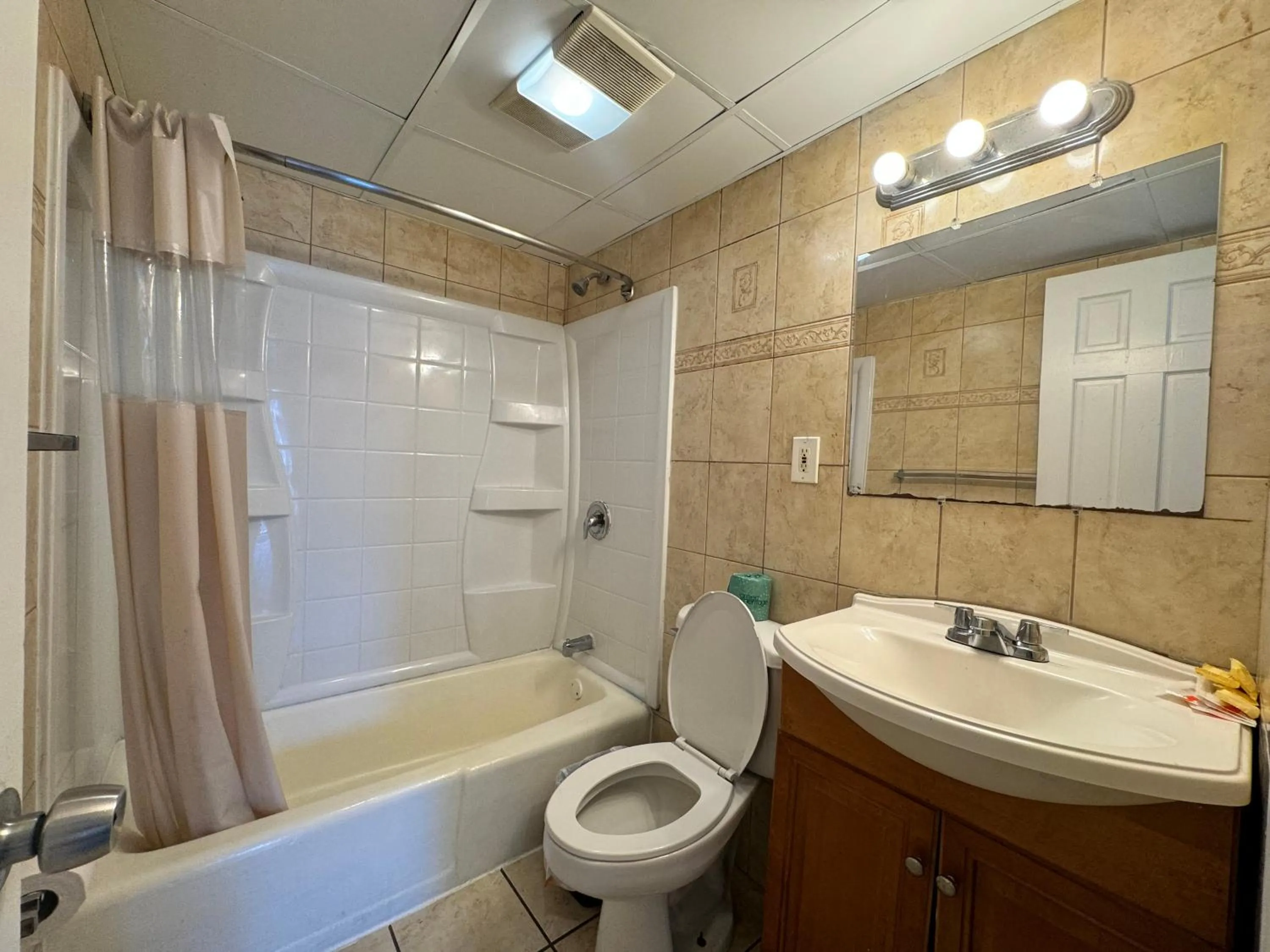 Shower in Skyview Manor Motel