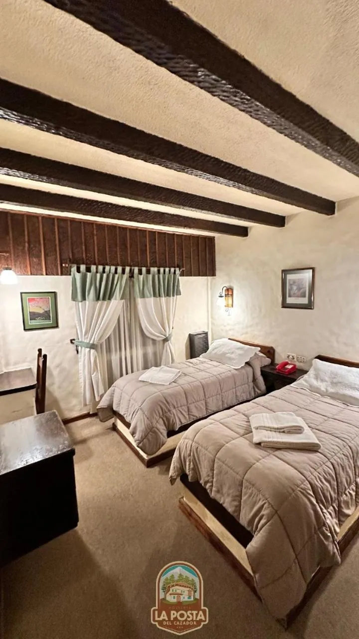 Bed in Hostería La Posta Del Cazador