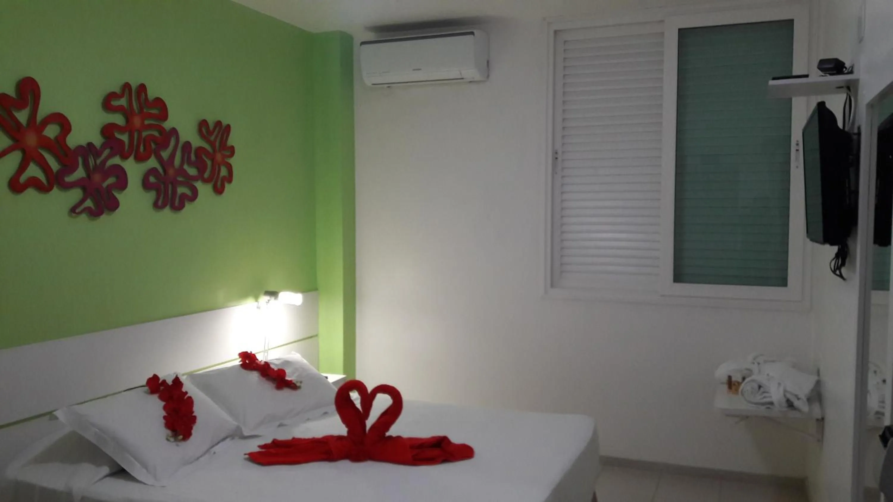 Bed in Coqueiros Express Hotel