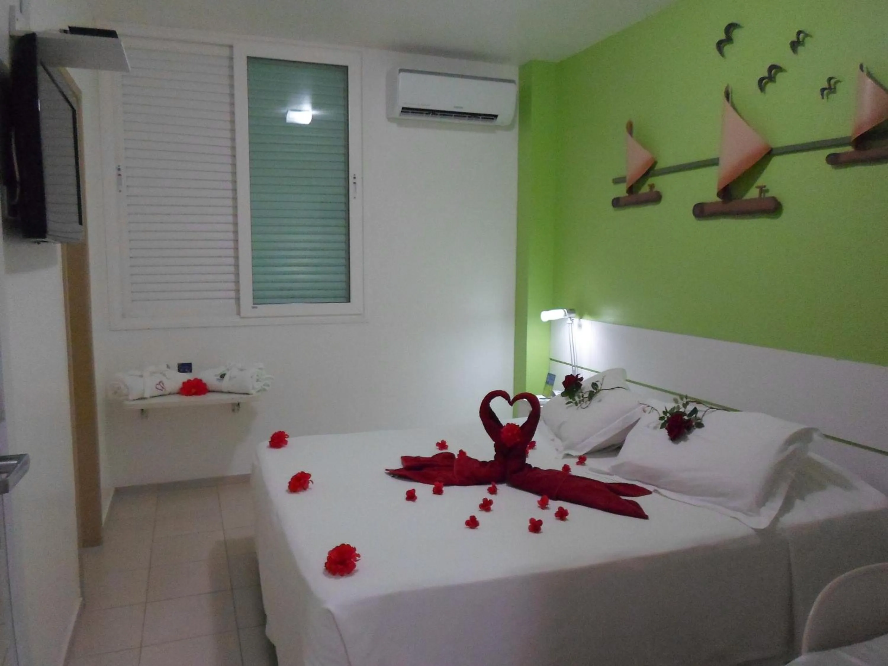 Bed in Coqueiros Express Hotel