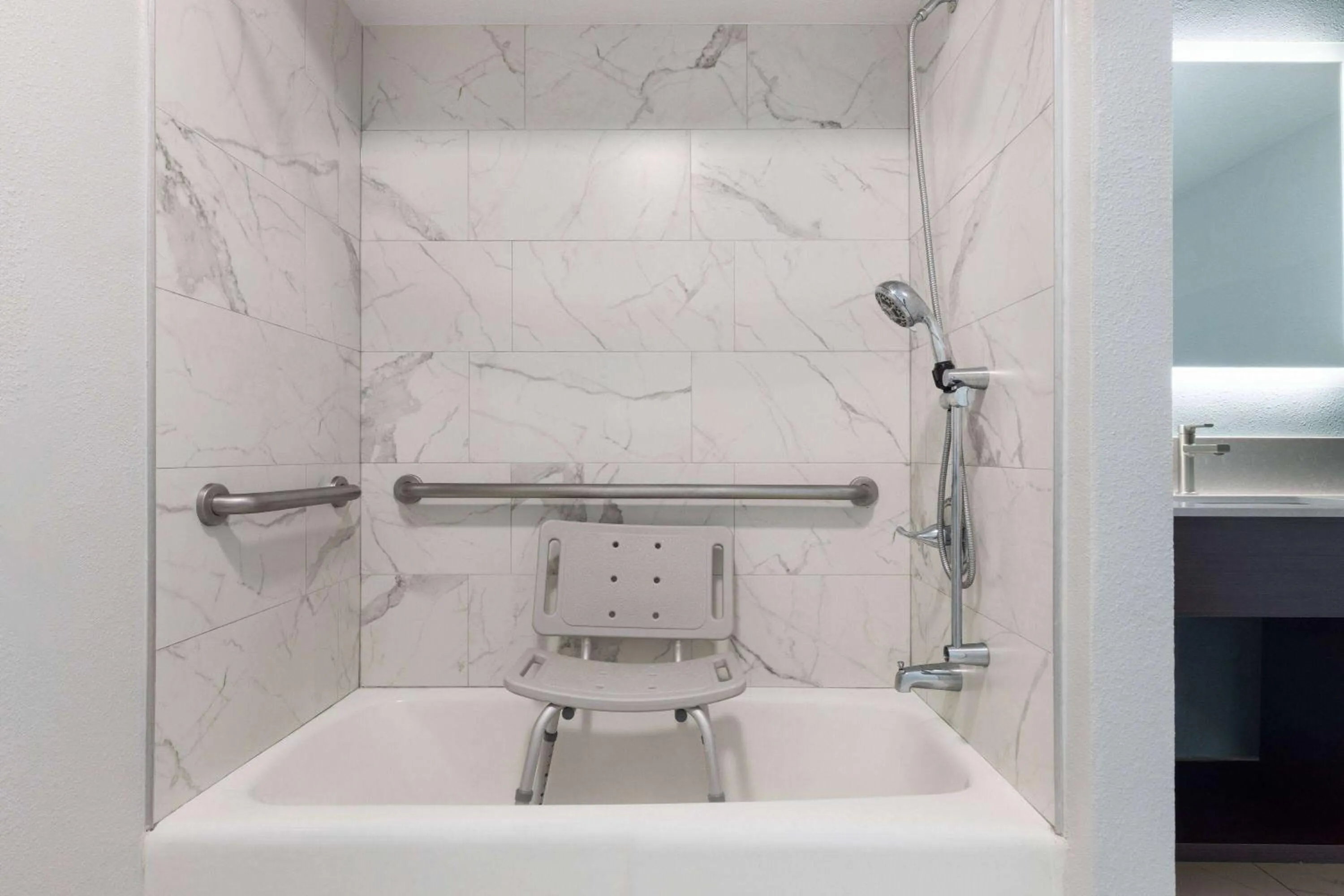 Bathroom in Travelodge by Wyndham Lemoore Near Naval Air Station