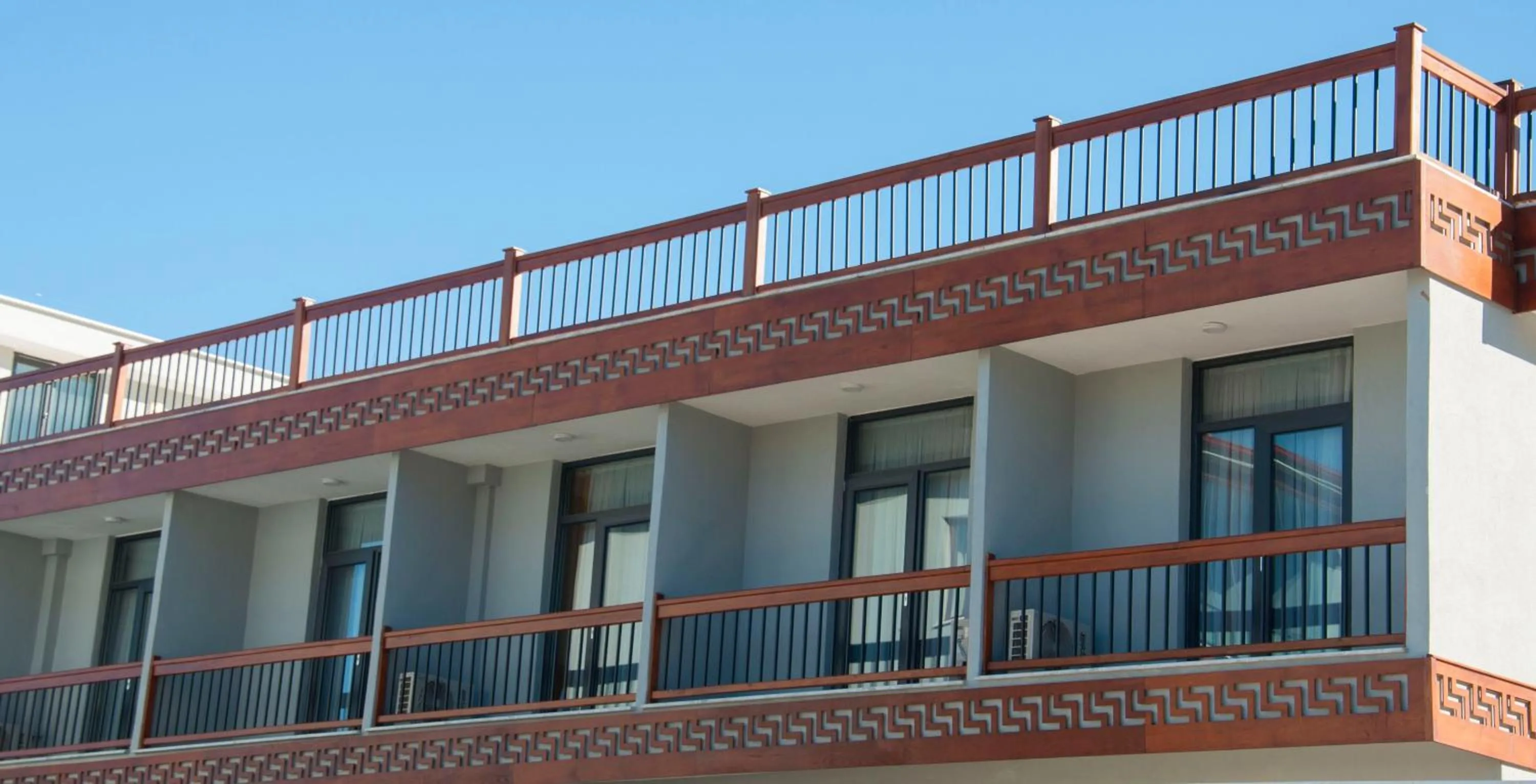 Property building in Room Room Motel