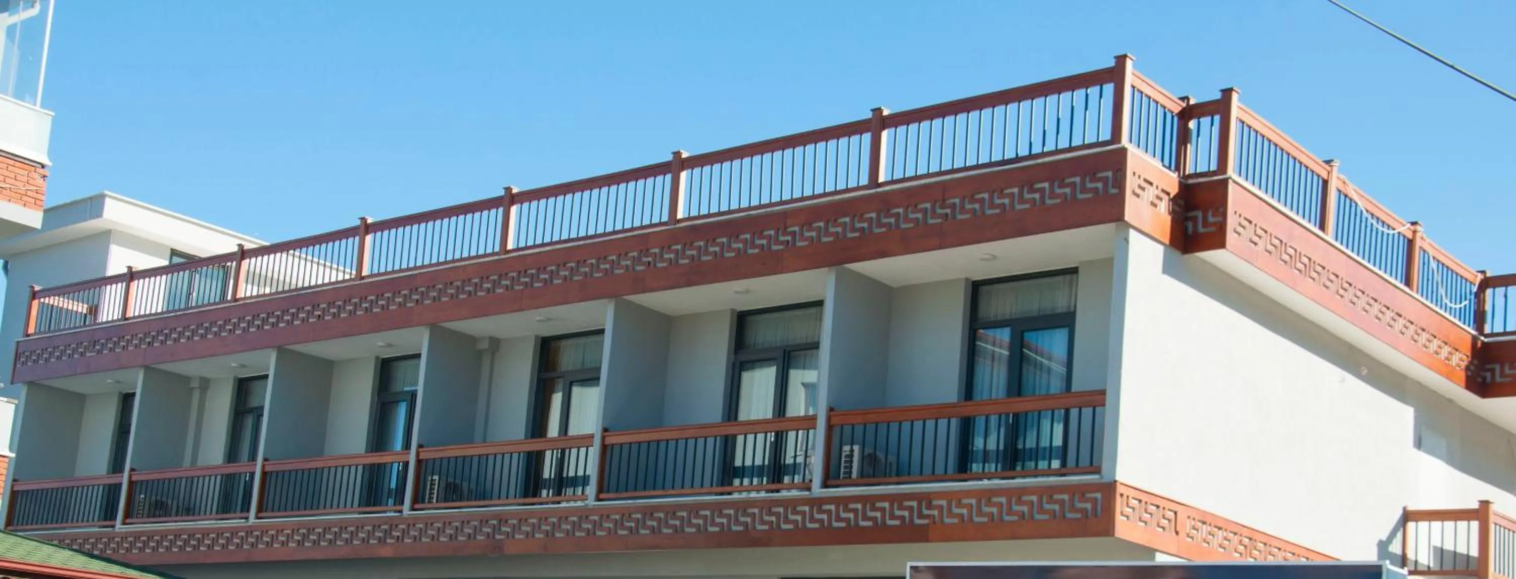 Property building in Room Room Motel