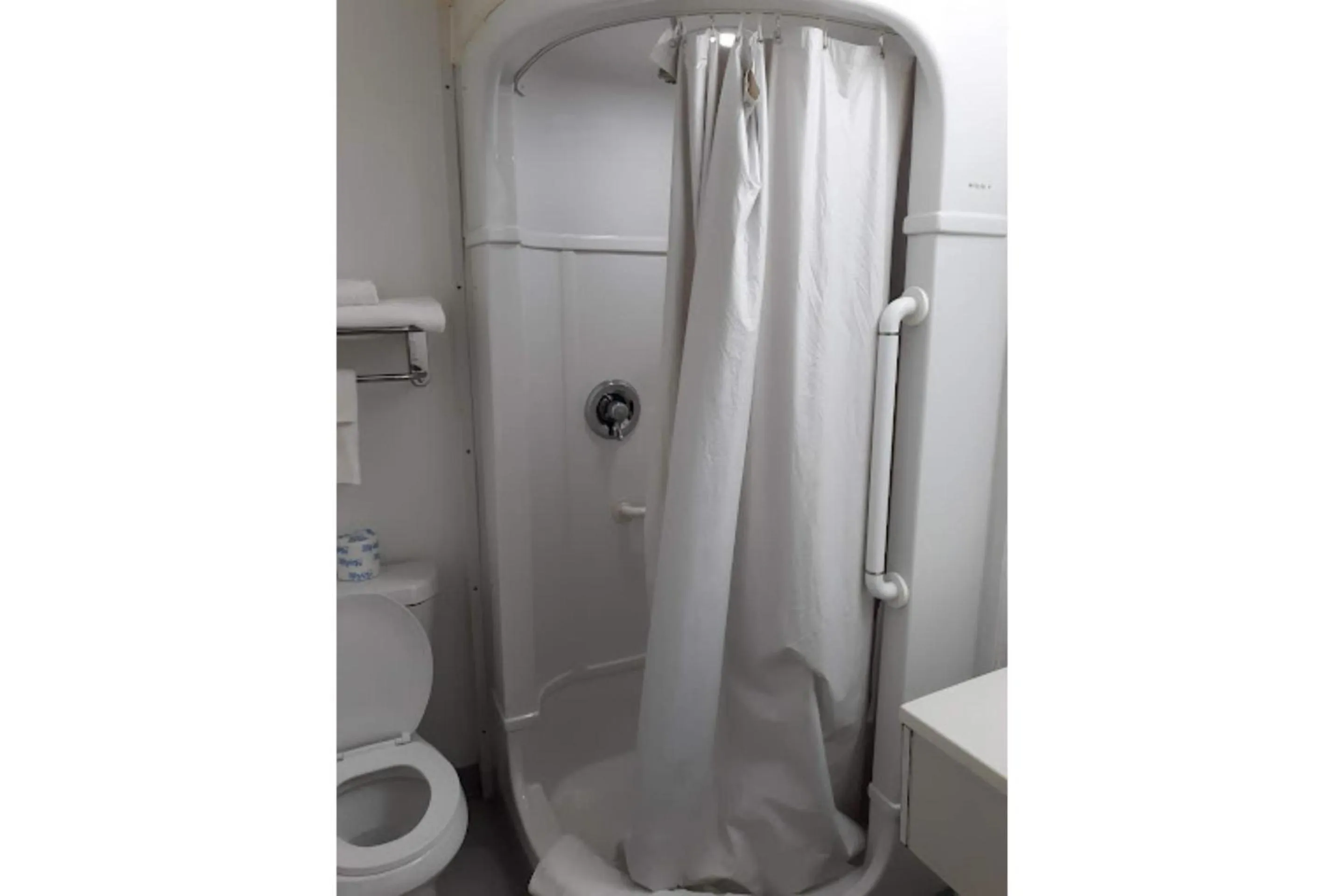 Bathroom in Travel Inn By OYO Omaha