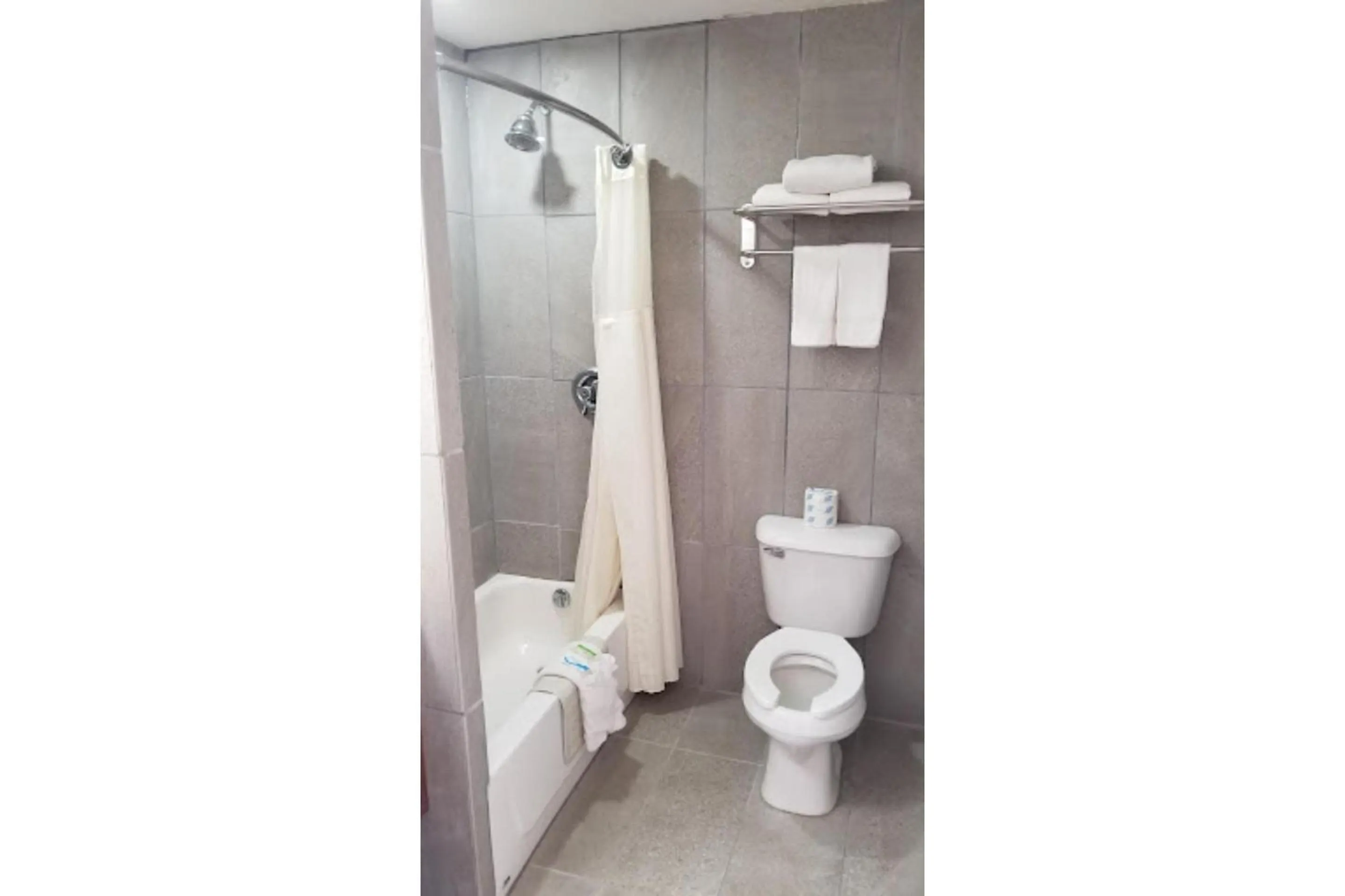 Bathroom in Travel Inn By OYO Omaha