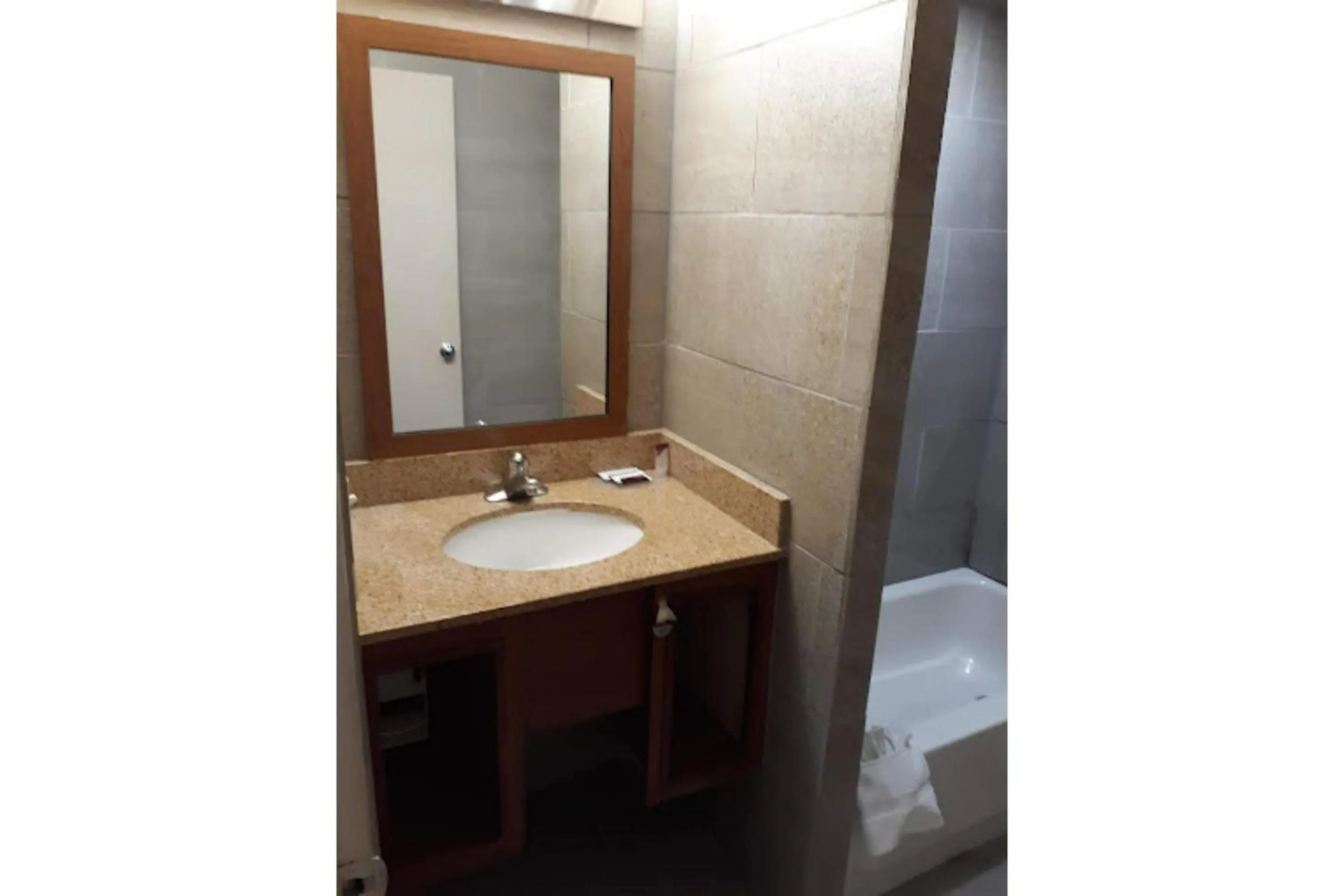 Bathroom in Travel Inn By OYO Omaha