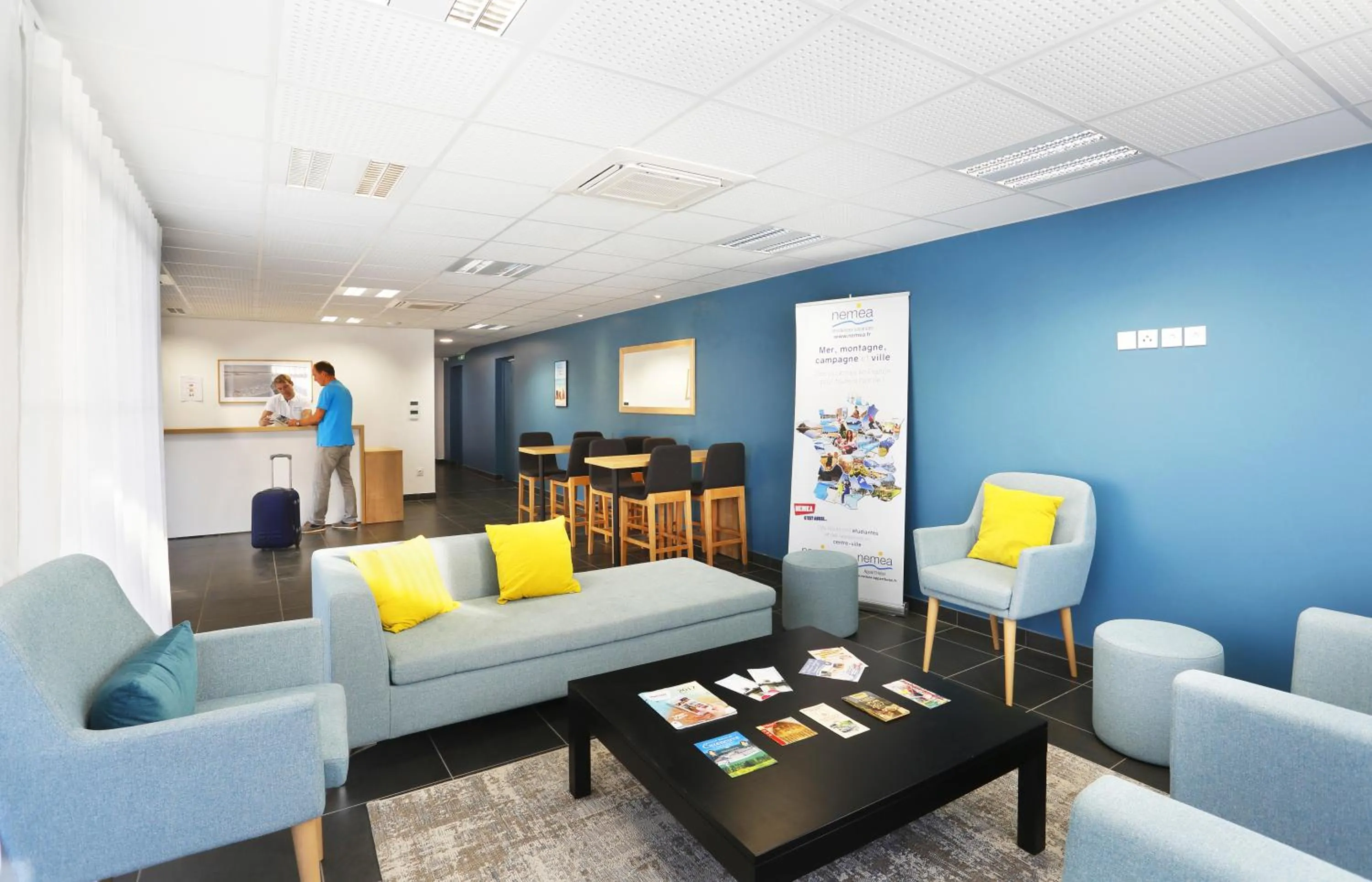 Communal lounge/ TV room in Résidence Néméa Le Marché de la Plage