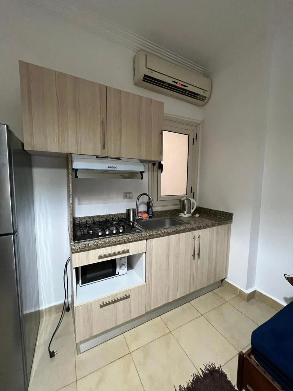 Kitchen or kitchenette in Lilly Apartments