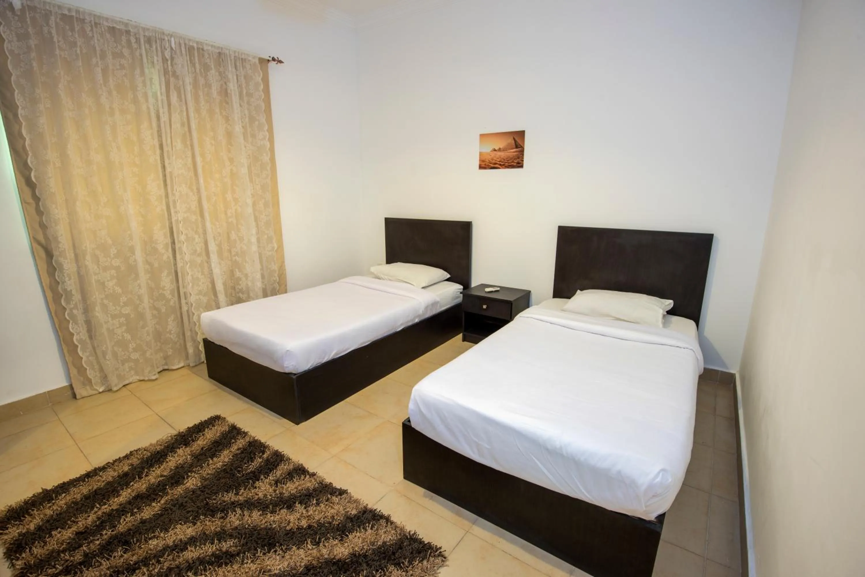 Bed in Lilly Apartments