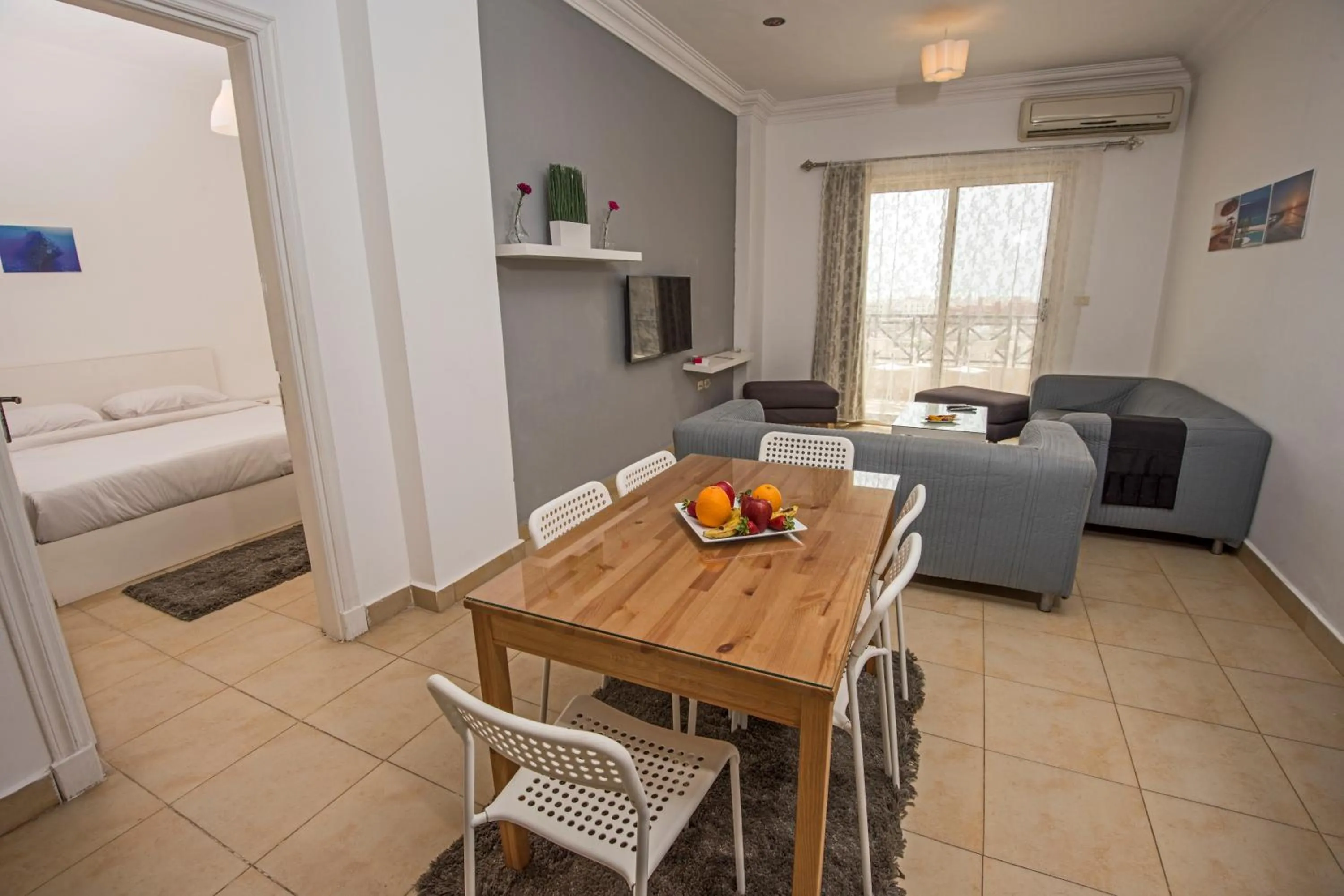 Living room, Bed in Lilly Apartments