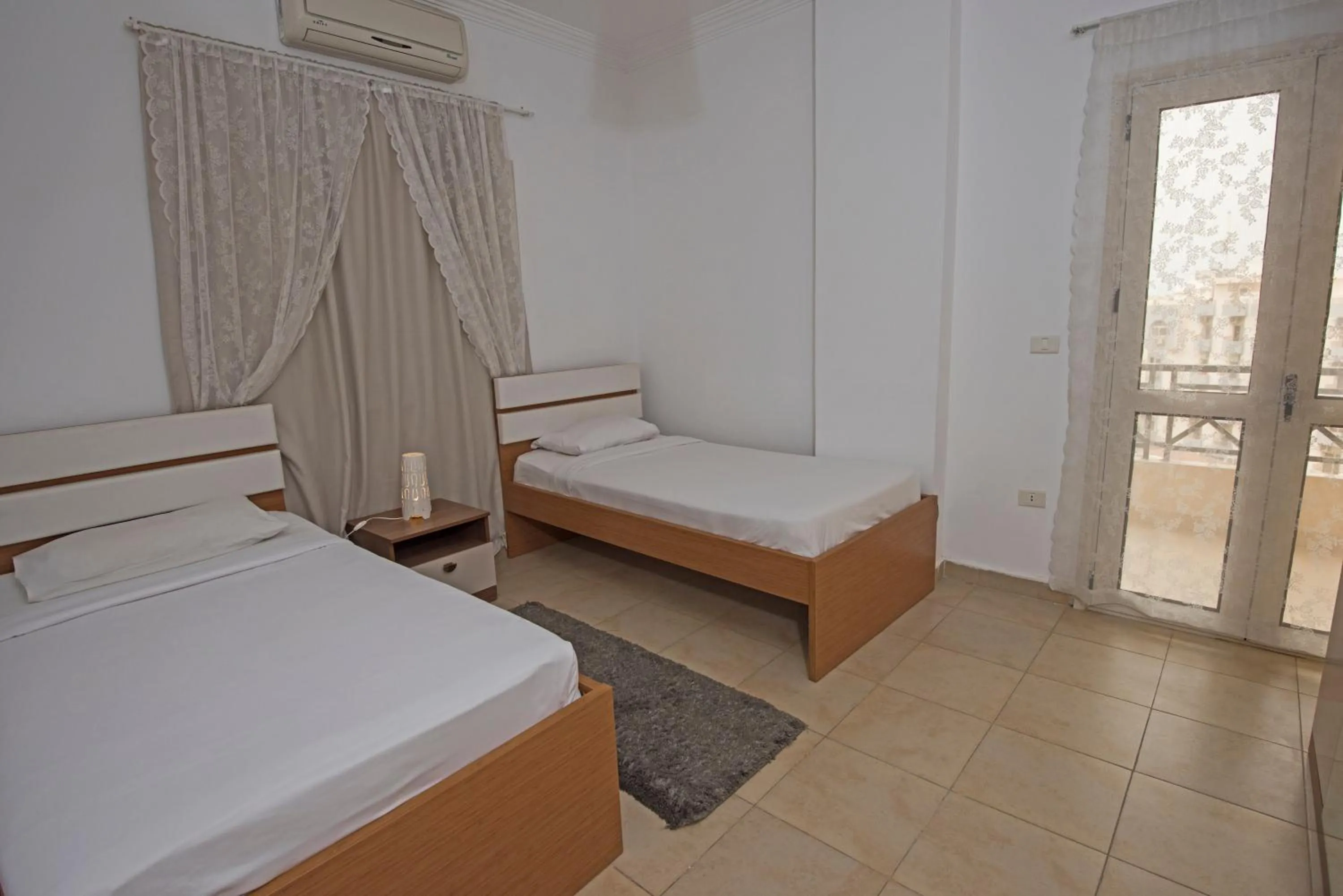 Bed in Lilly Apartments