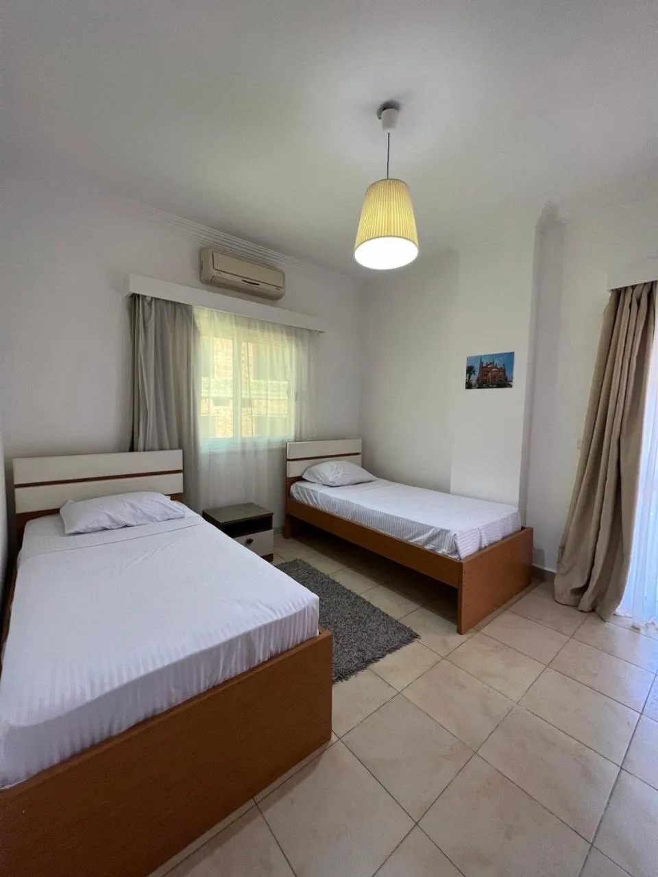 Bed in Lilly Apartments