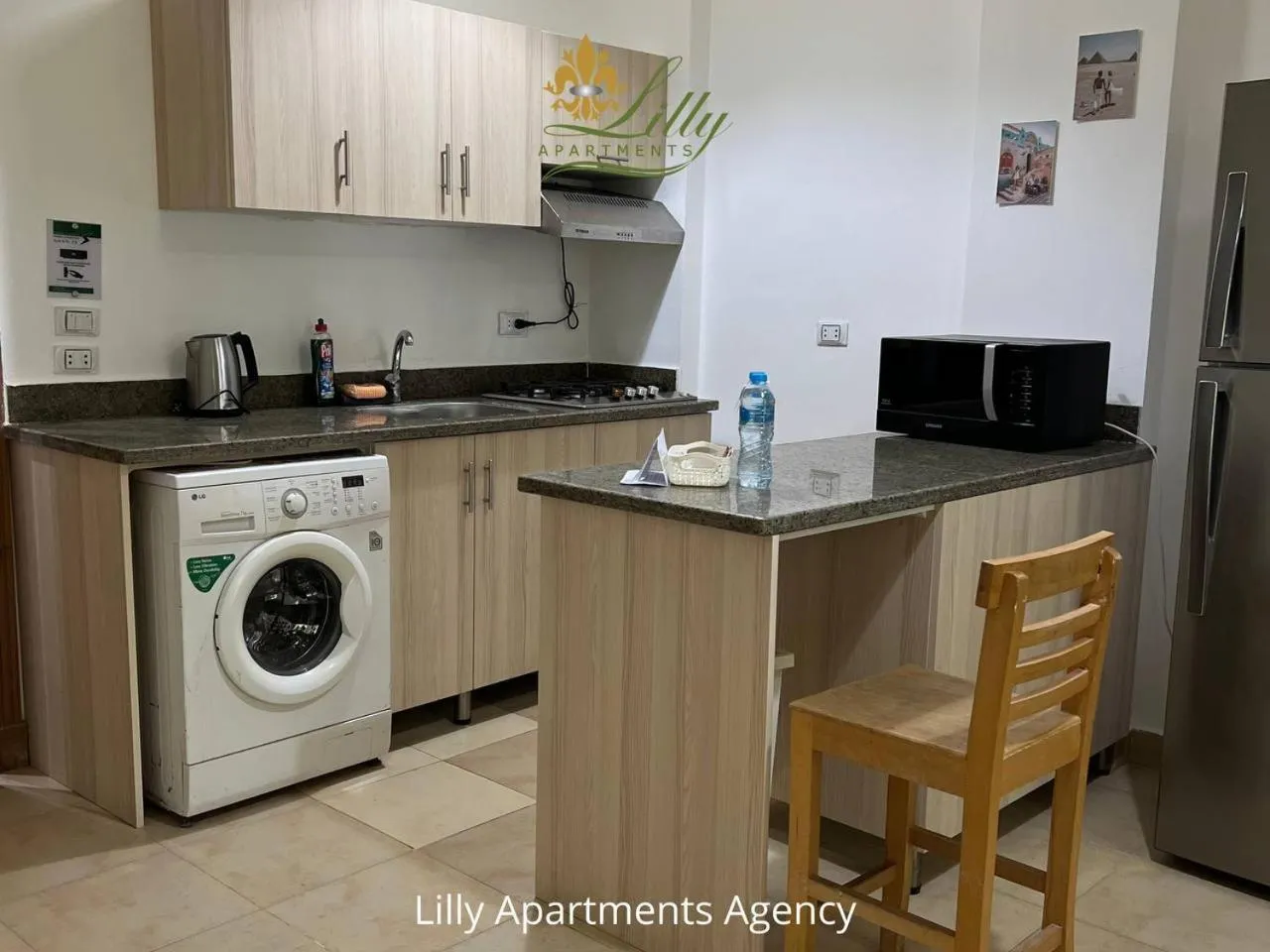 Kitchen or kitchenette in Lilly Apartments