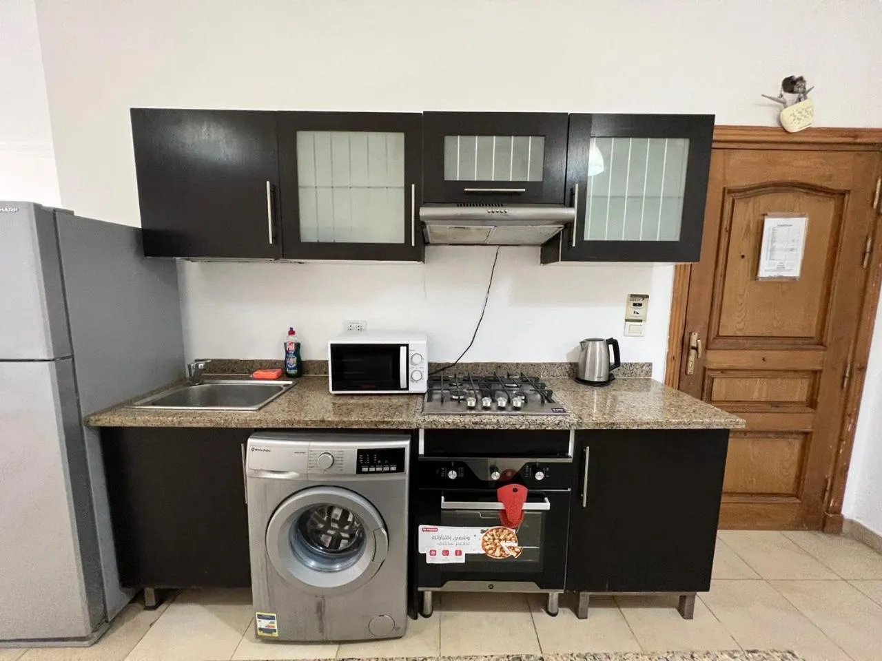 kitchen in Lilly Apartments