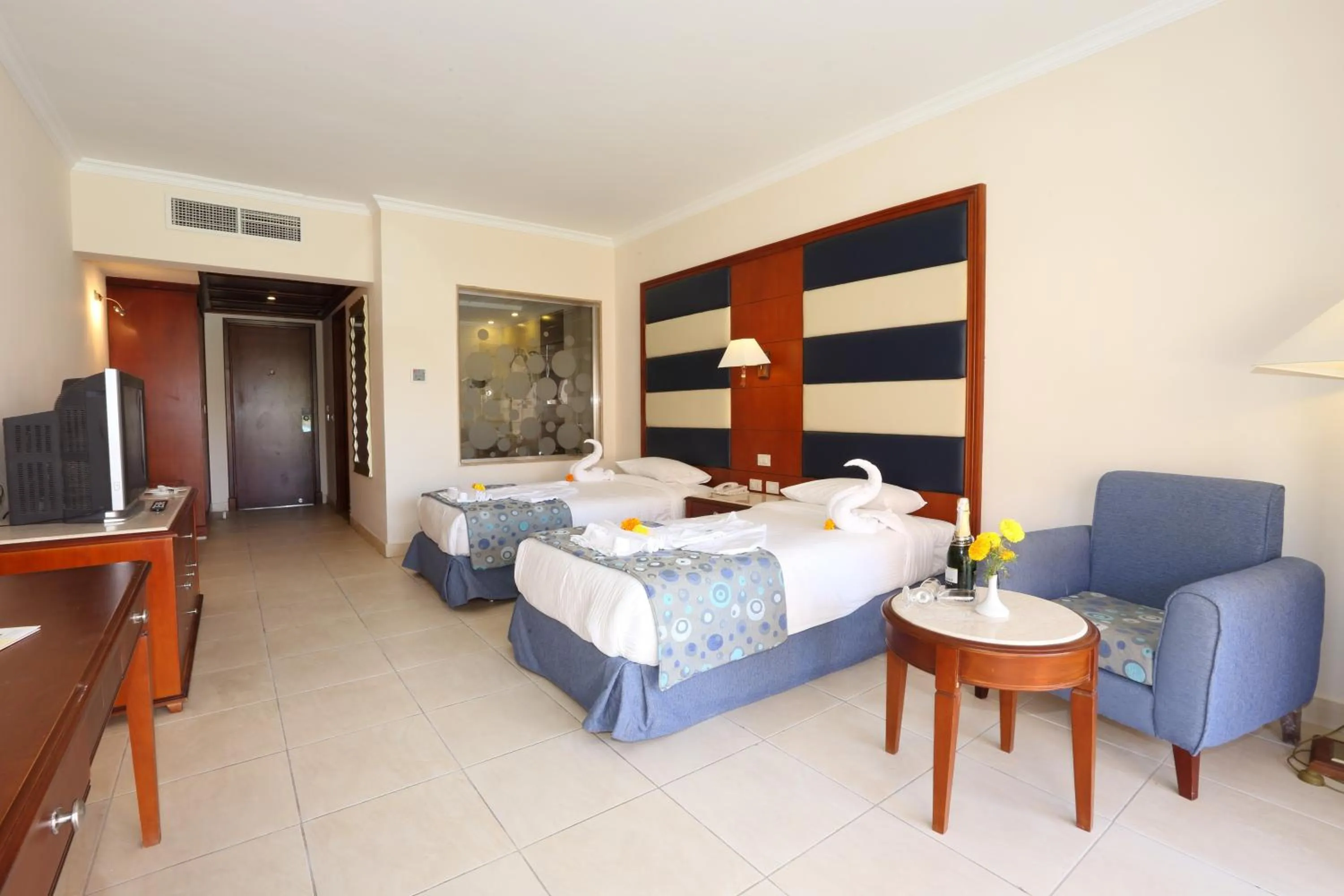 Photo of the whole room, Bed in Rehana Sharm Resort - Aquapark & Spa - Couples and Family Only -Premium Ultra All-Inclusive 24H