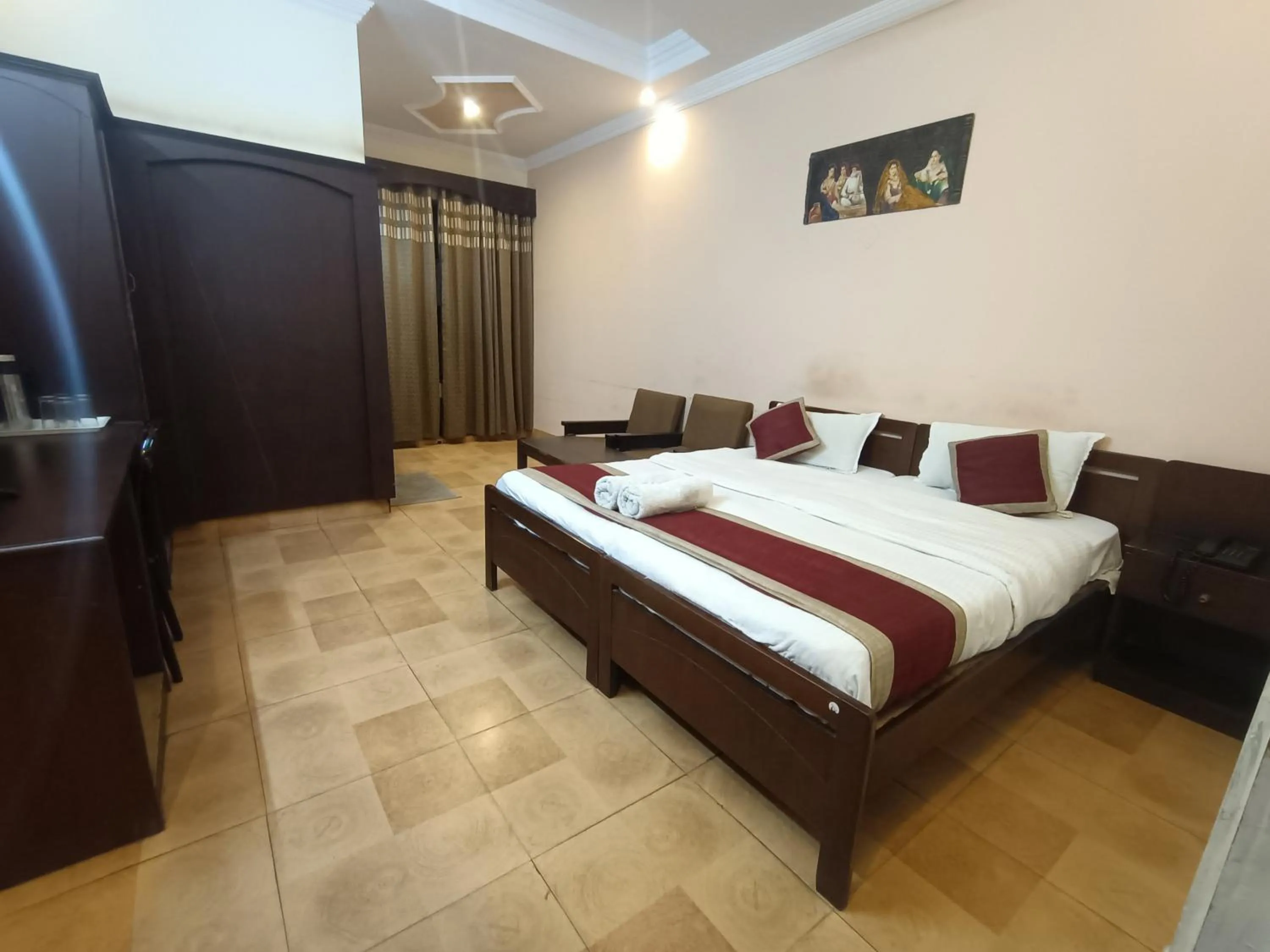 Bed in Hotel Midtown