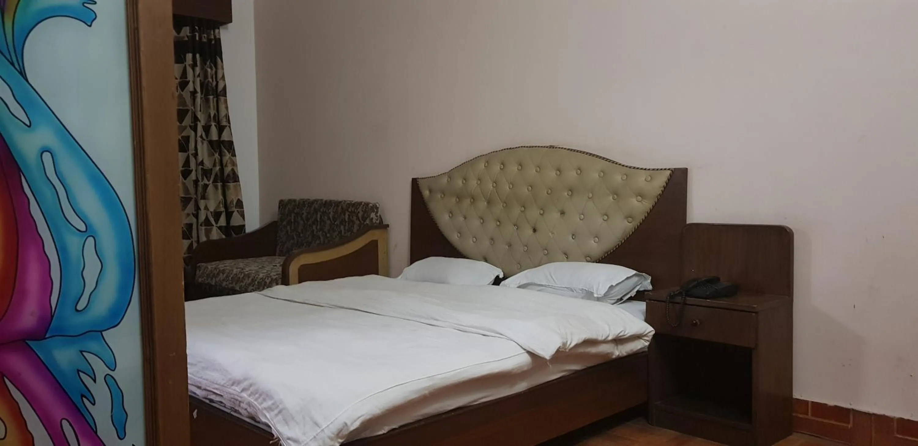 Bed in Hotel Midtown