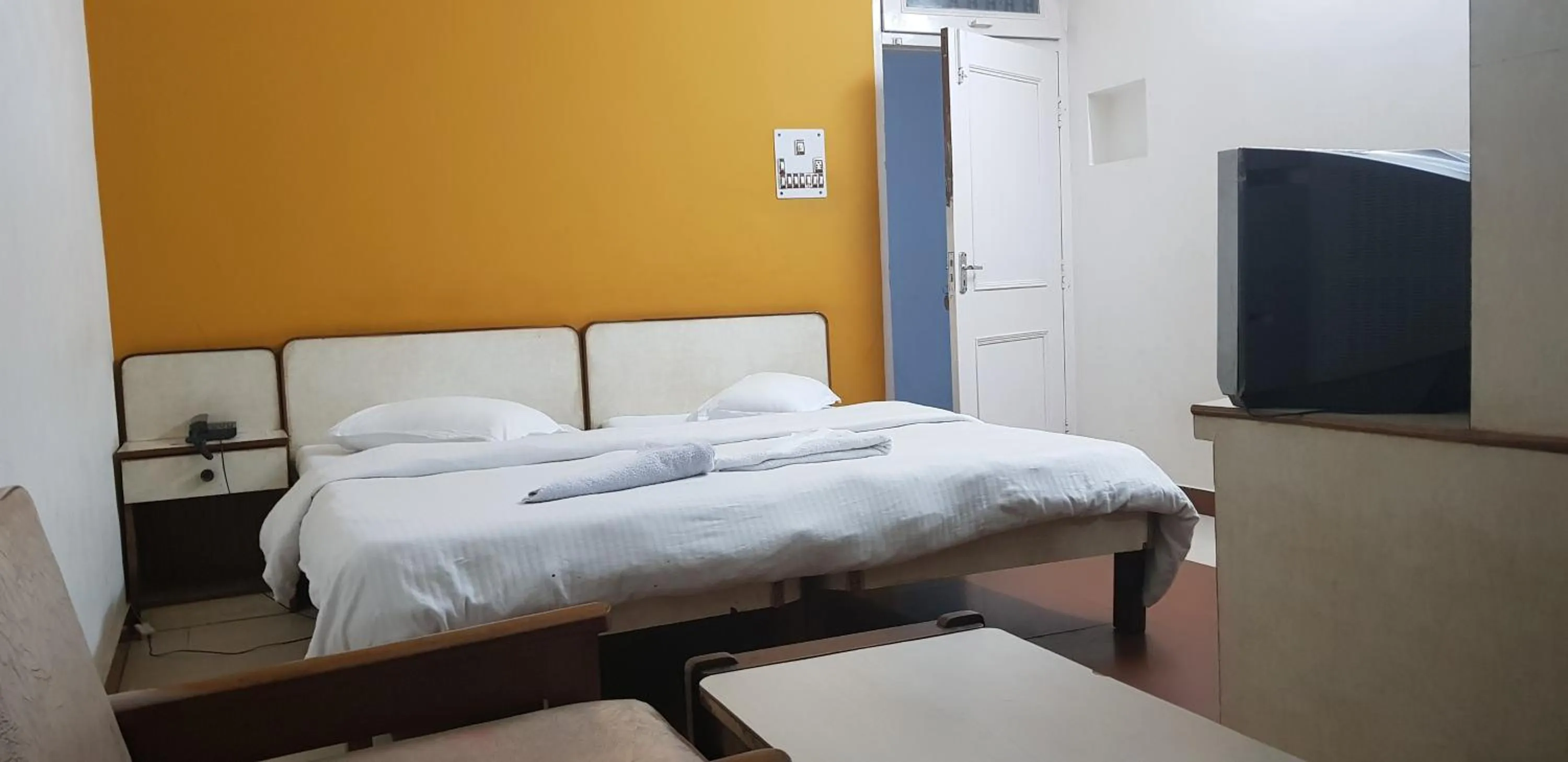 Bed in Hotel Midtown