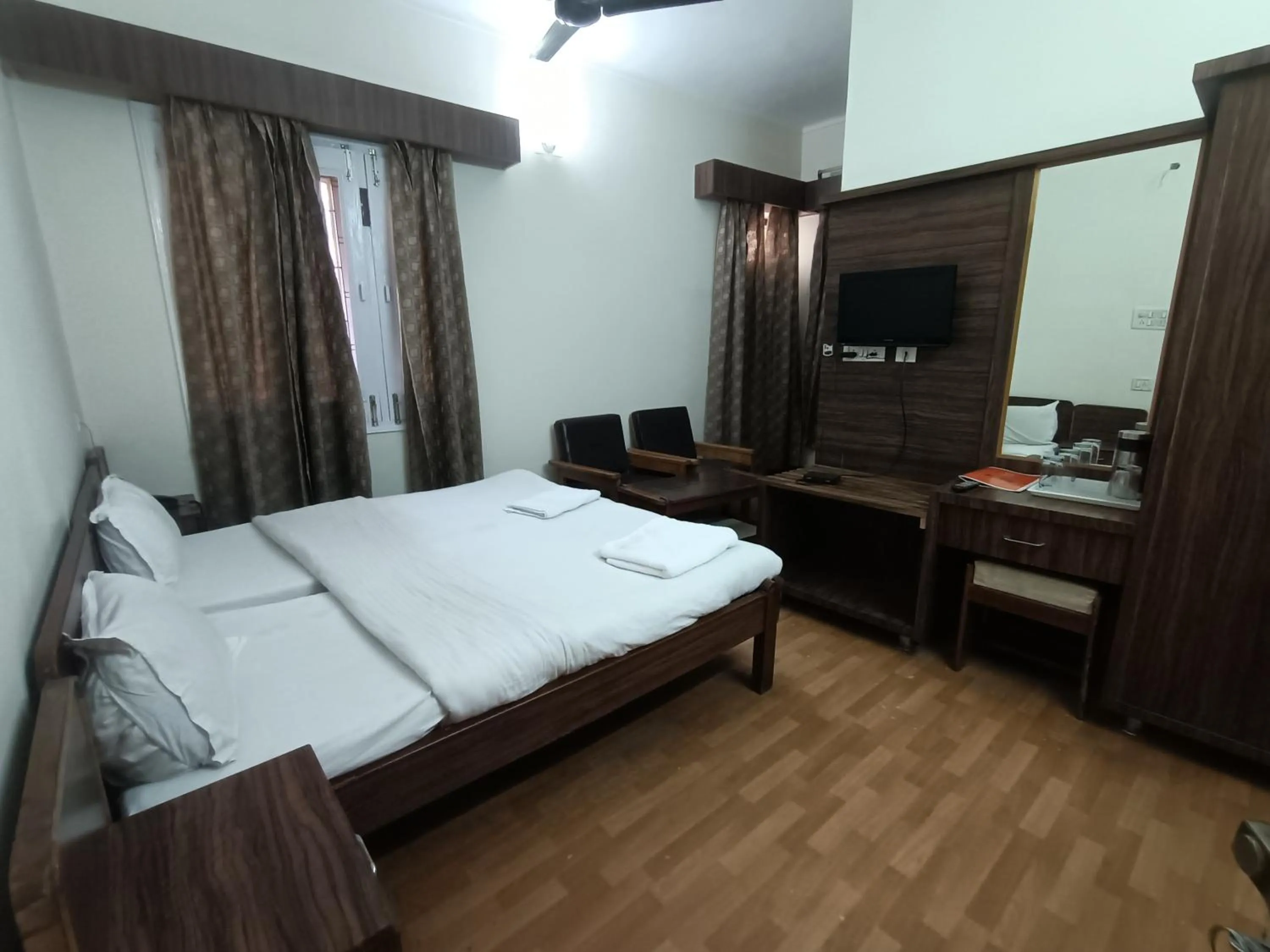 Bed in Hotel Midtown