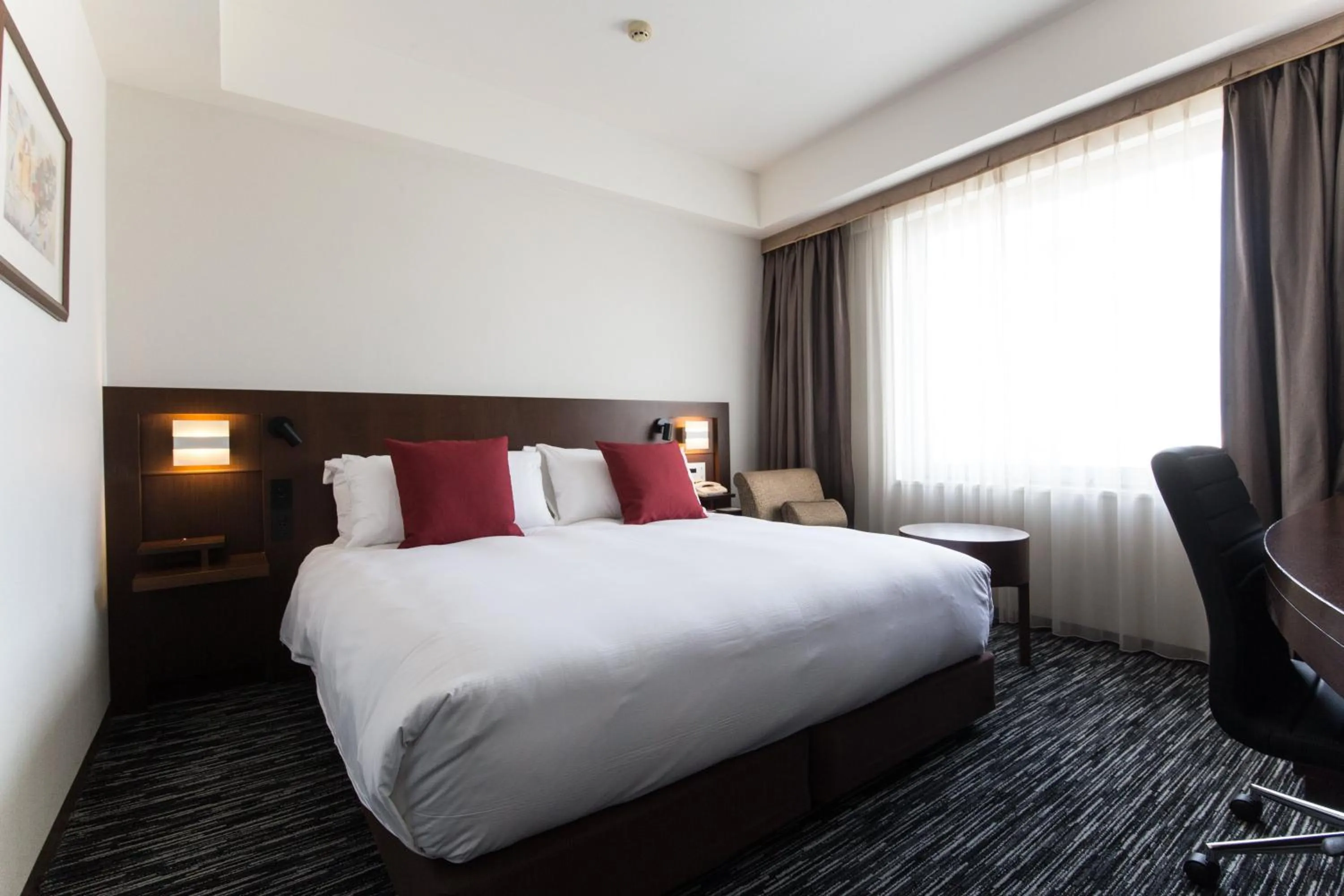Photo of the whole room, Bed in ANA Crowne Plaza Yonago by IHG