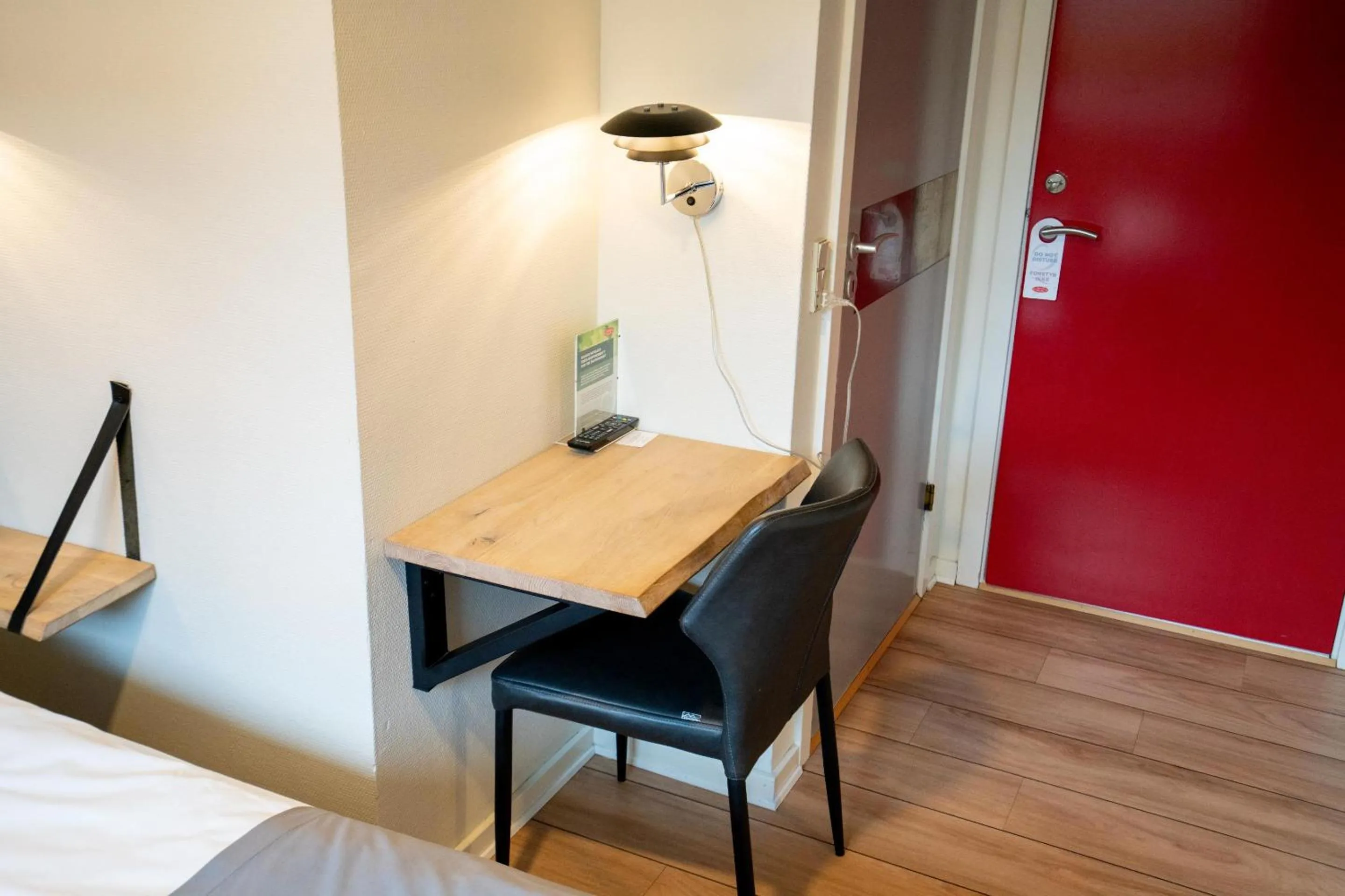 Seating area, Bed in Hotel Falken