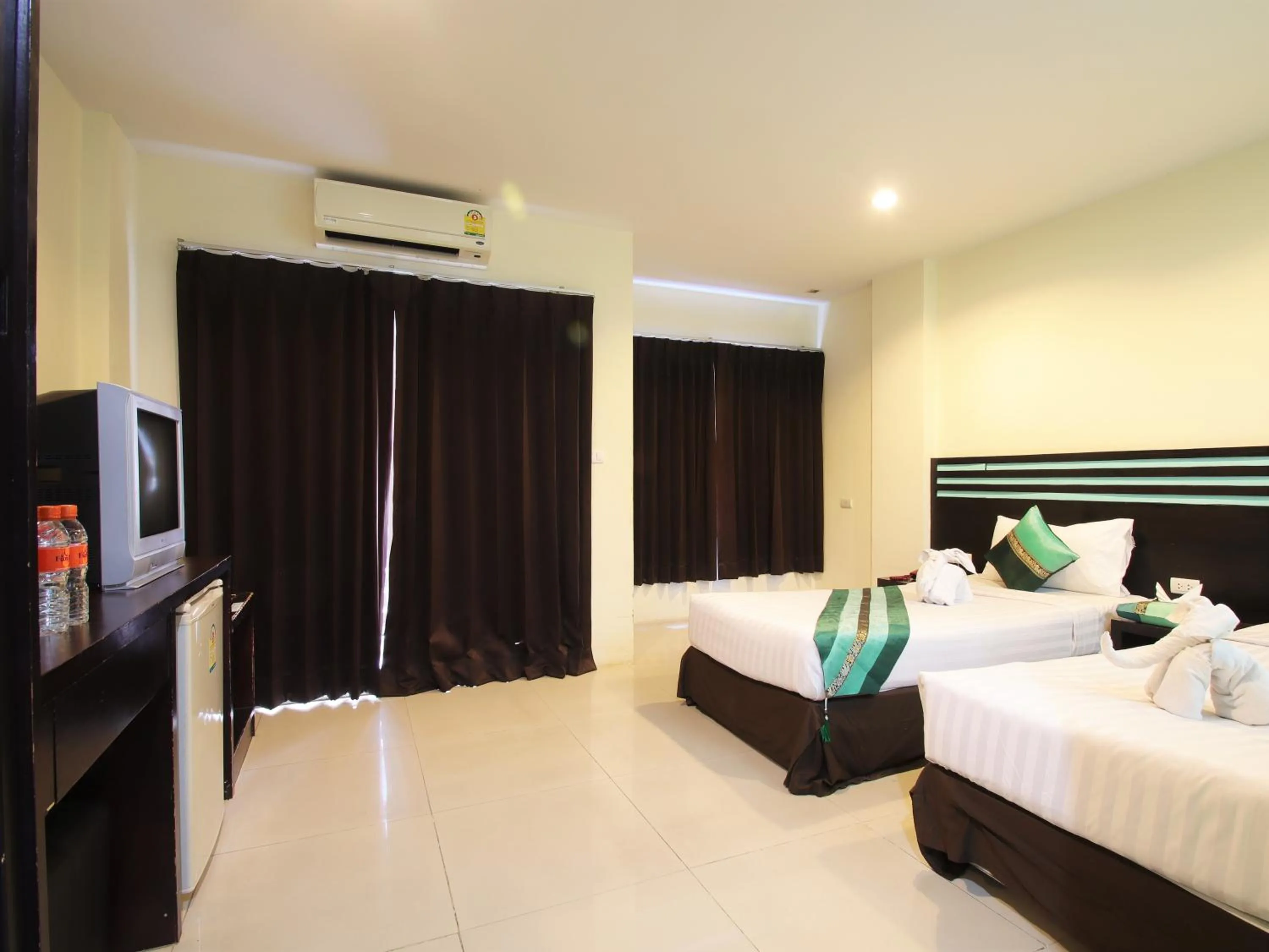 Bed in FunDee Boutique Hotel