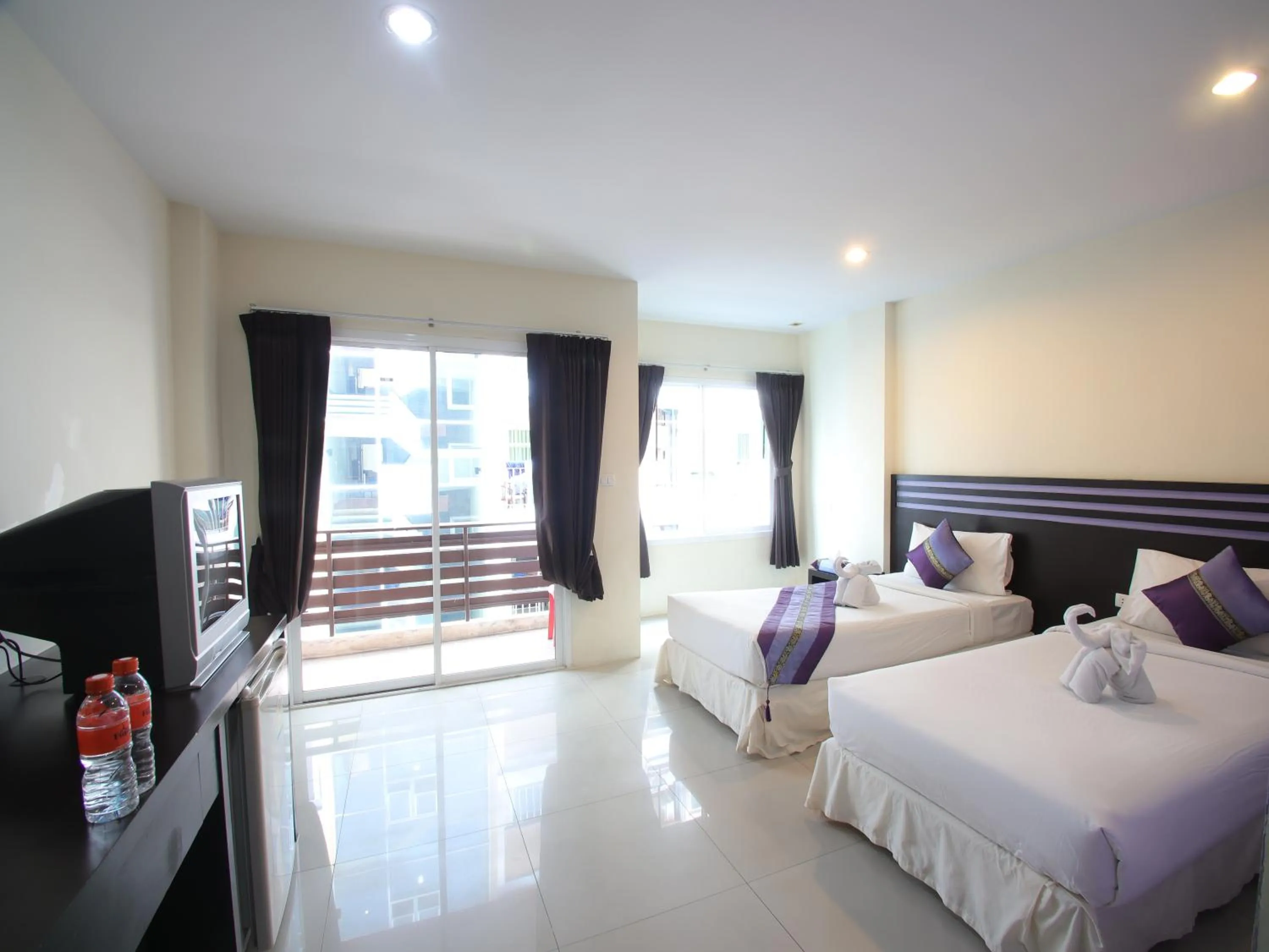 Bed in FunDee Boutique Hotel