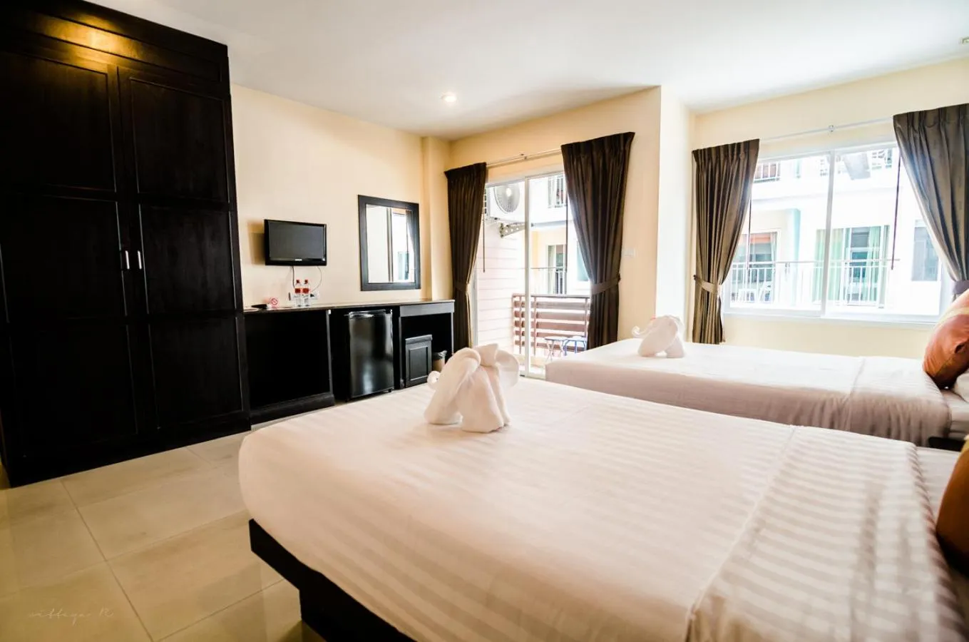 Bed in FunDee Boutique Hotel