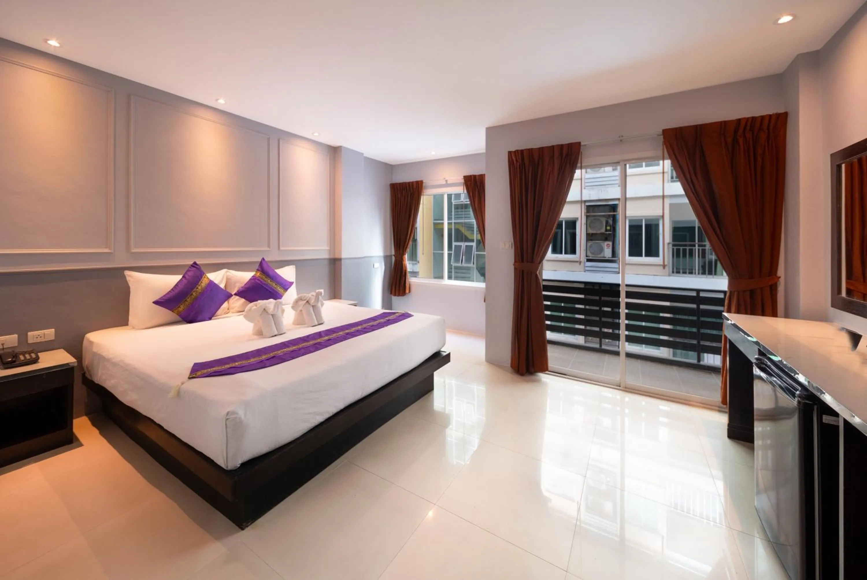Bed in FunDee Boutique Hotel