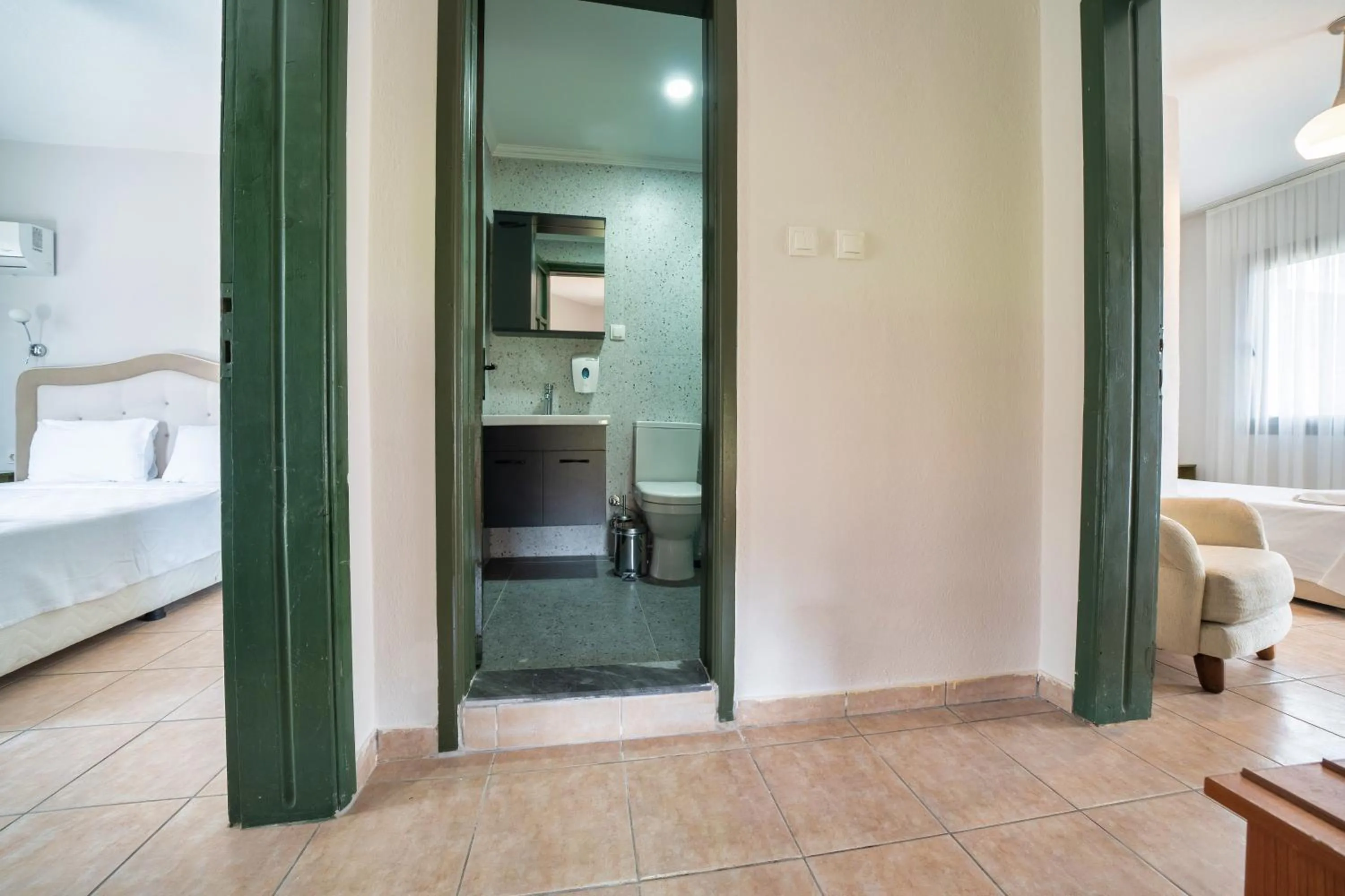 Bed in Dedeminn Garden Hotel