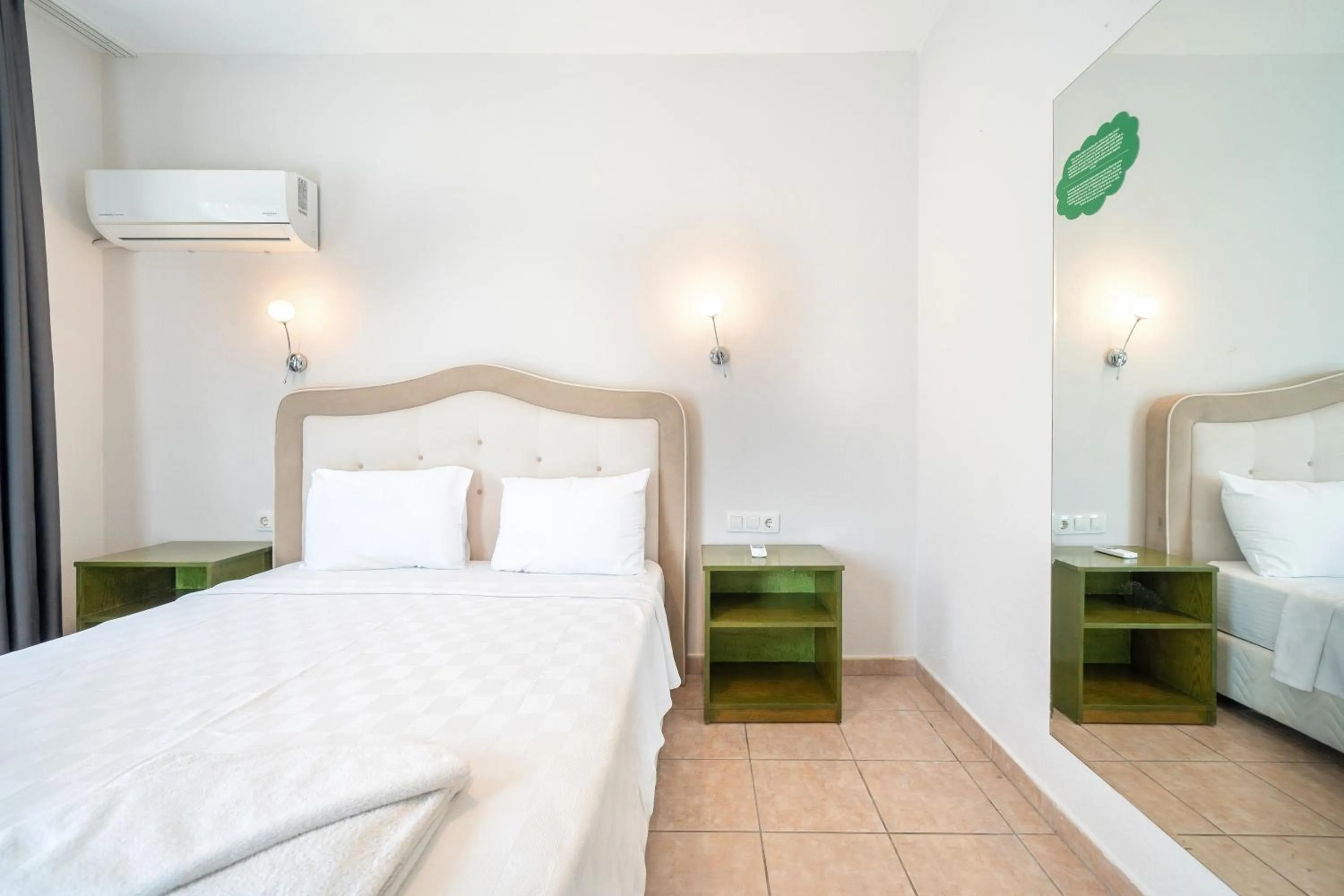 Bed in Dedeminn Garden Hotel