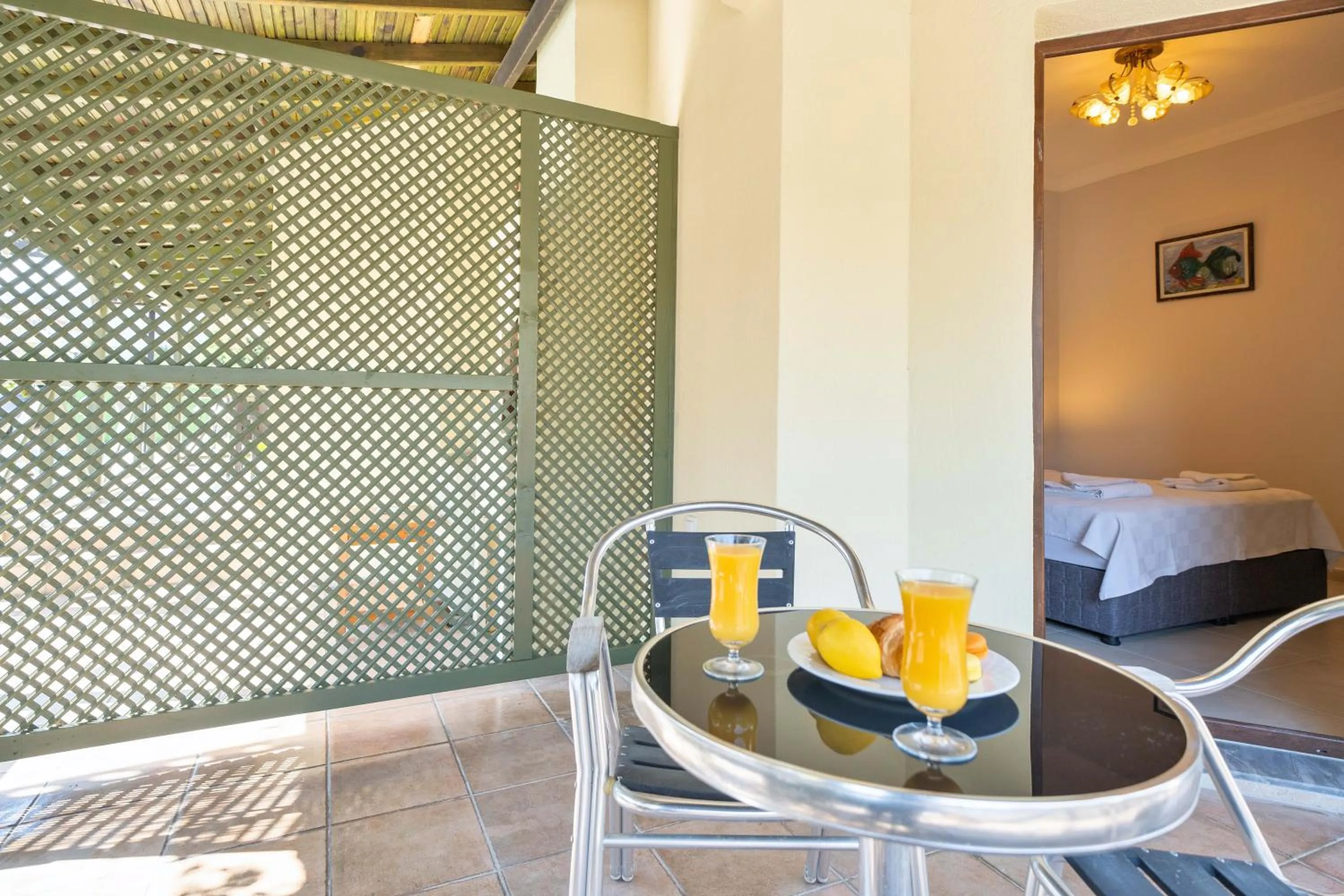 Balcony/Terrace, Bed in Dedeminn Garden Hotel