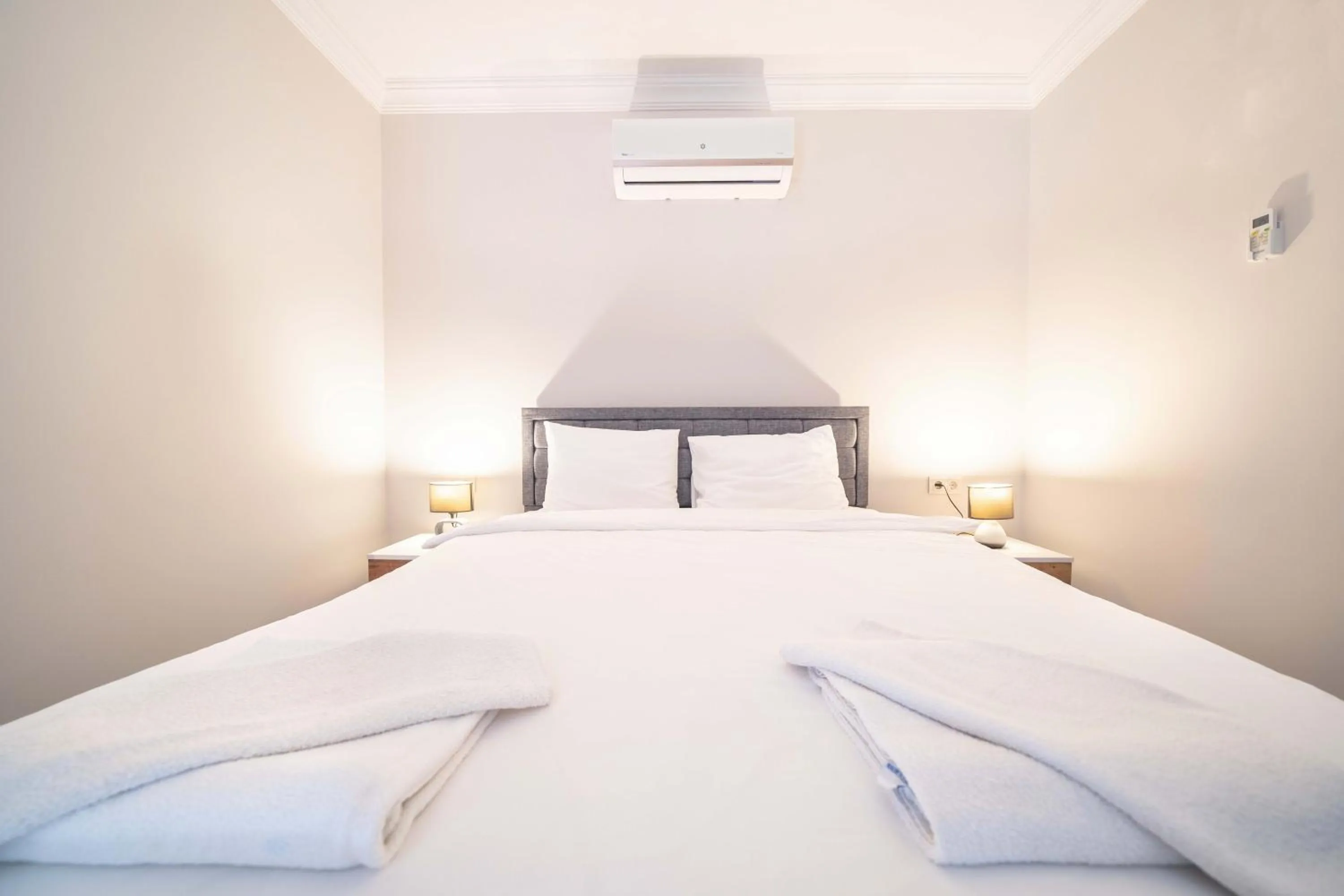 Bed in Dedeminn Garden Hotel