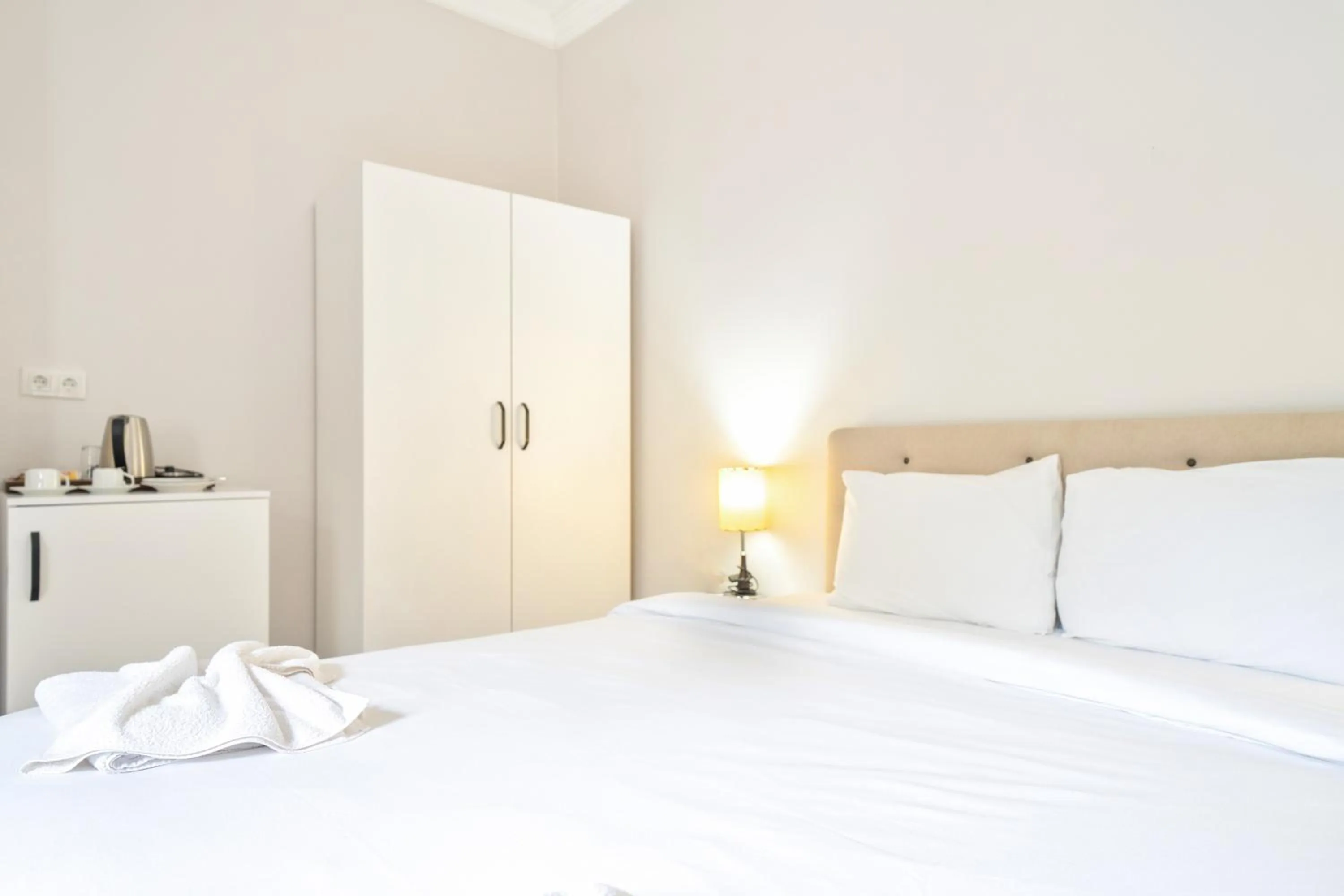 Bed in Dedeminn Garden Hotel