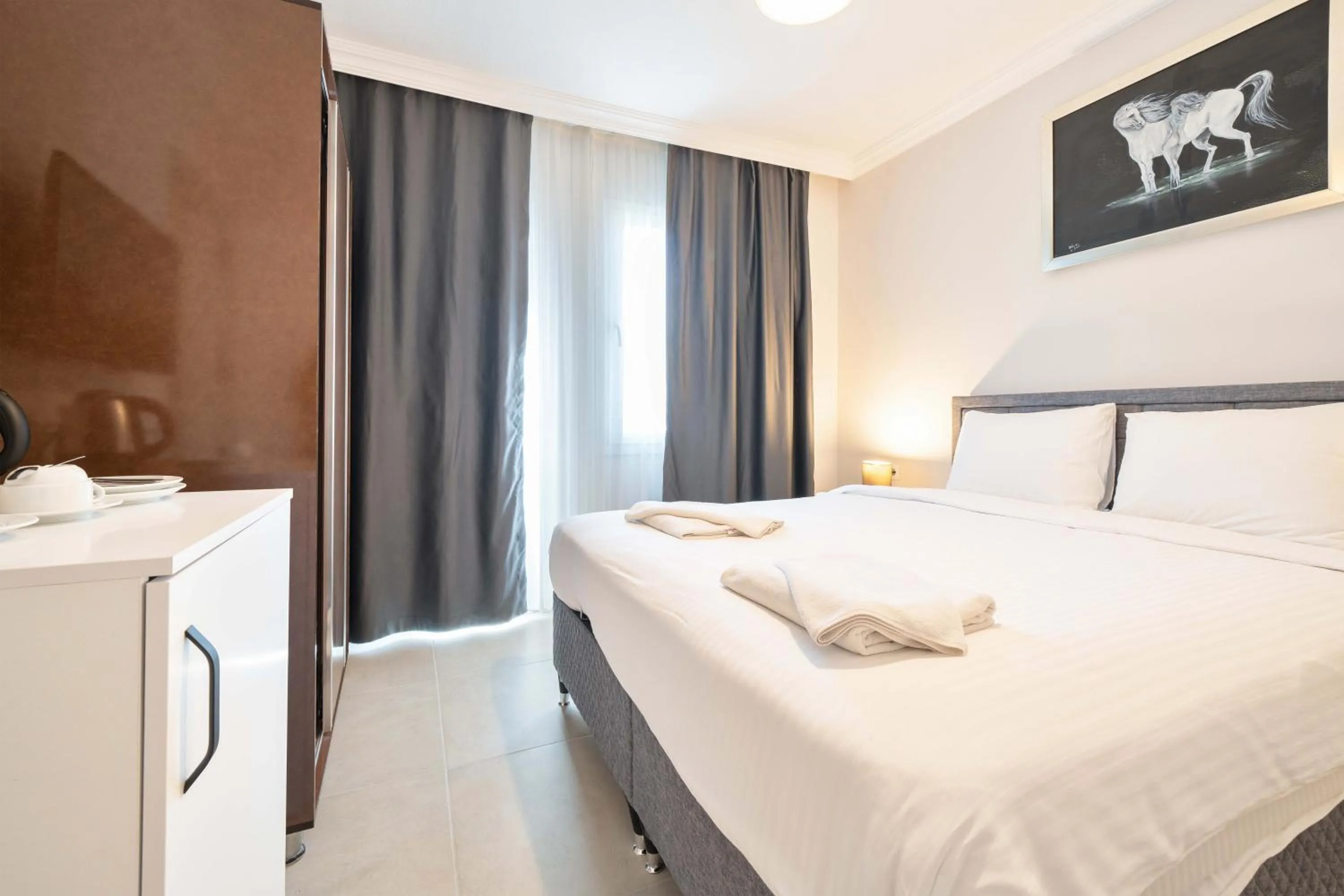 Bed in Dedeminn Garden Hotel