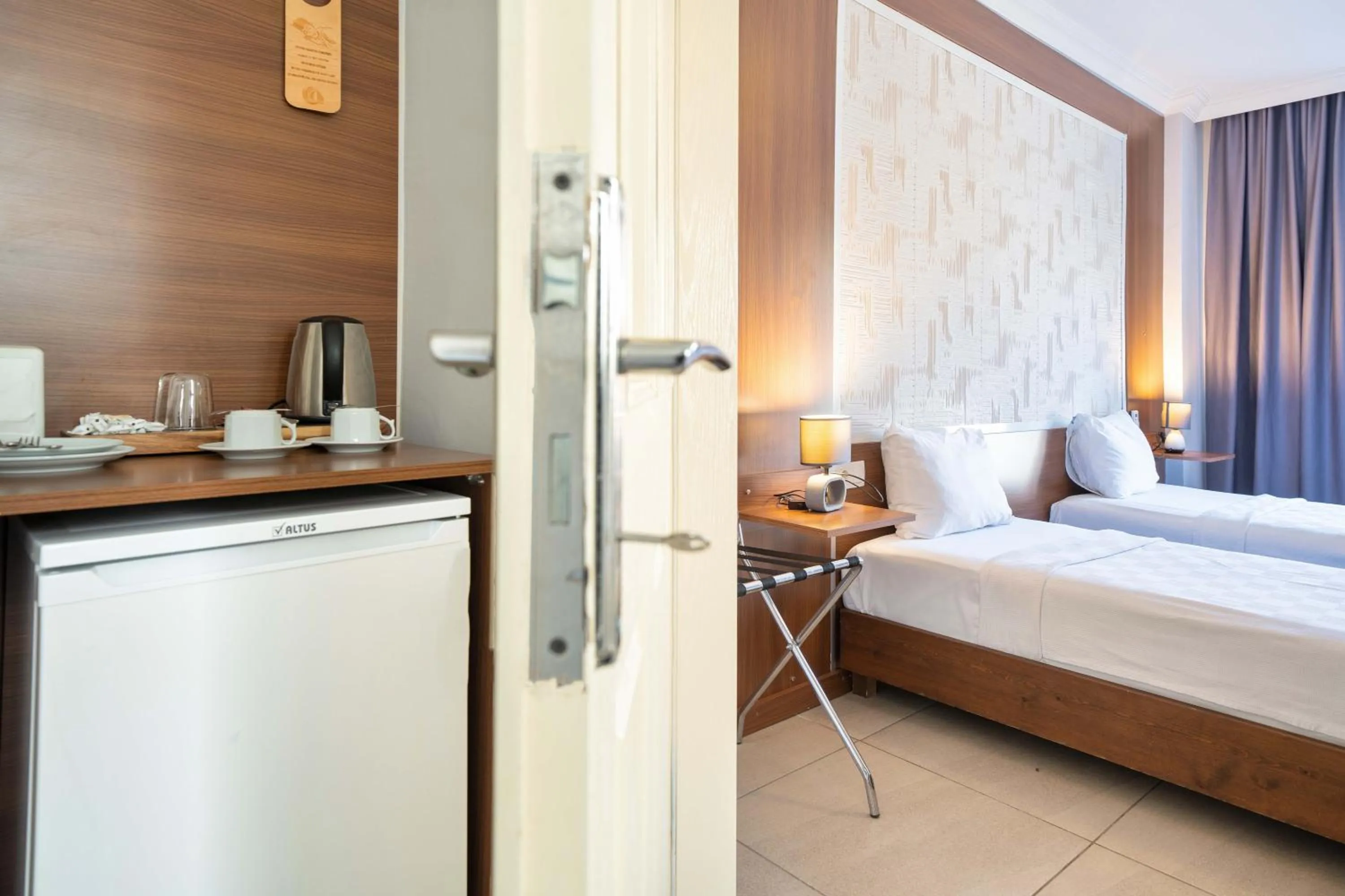 Bed in Dedeminn Garden Hotel