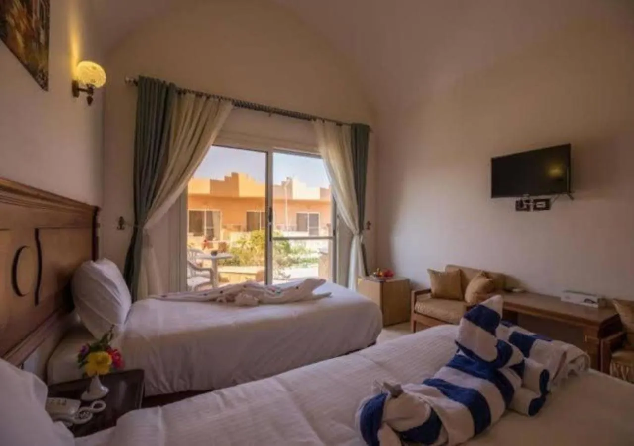 Bed in Silver Beach Boutique Hotel