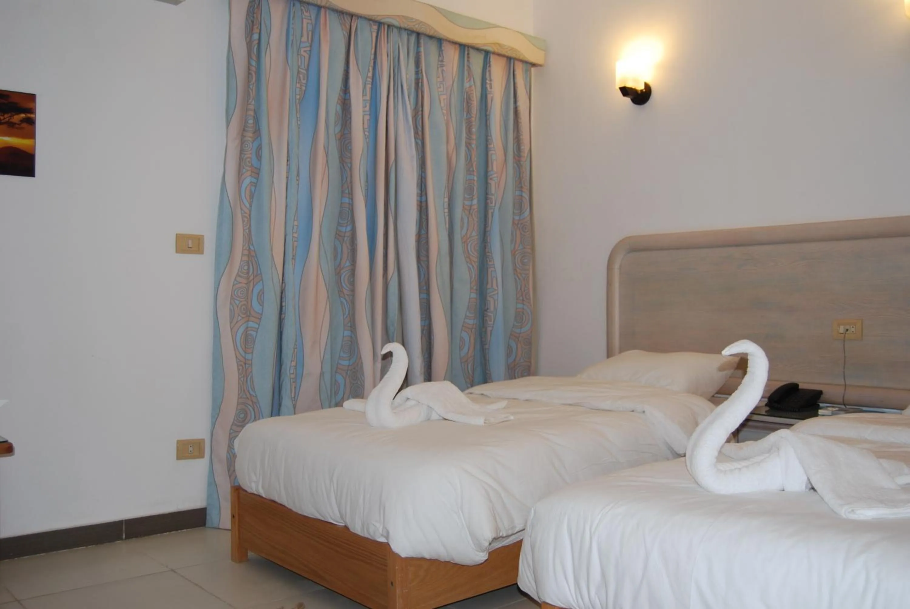 Bed in Acacia Dahab Hotel