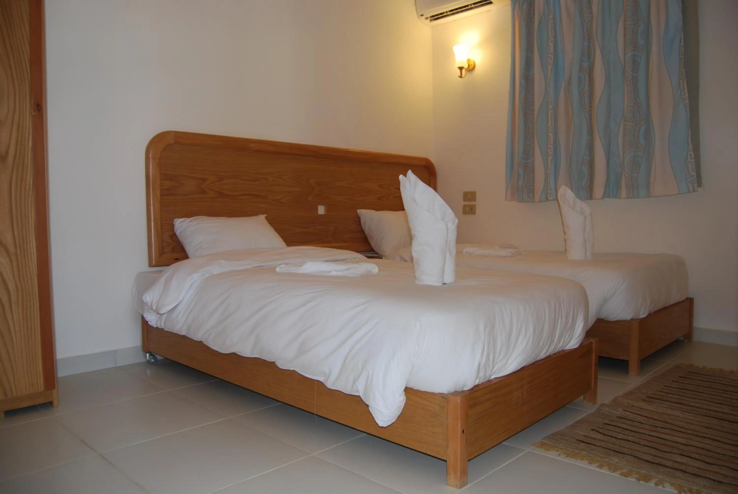 Bed in Acacia Dahab Hotel