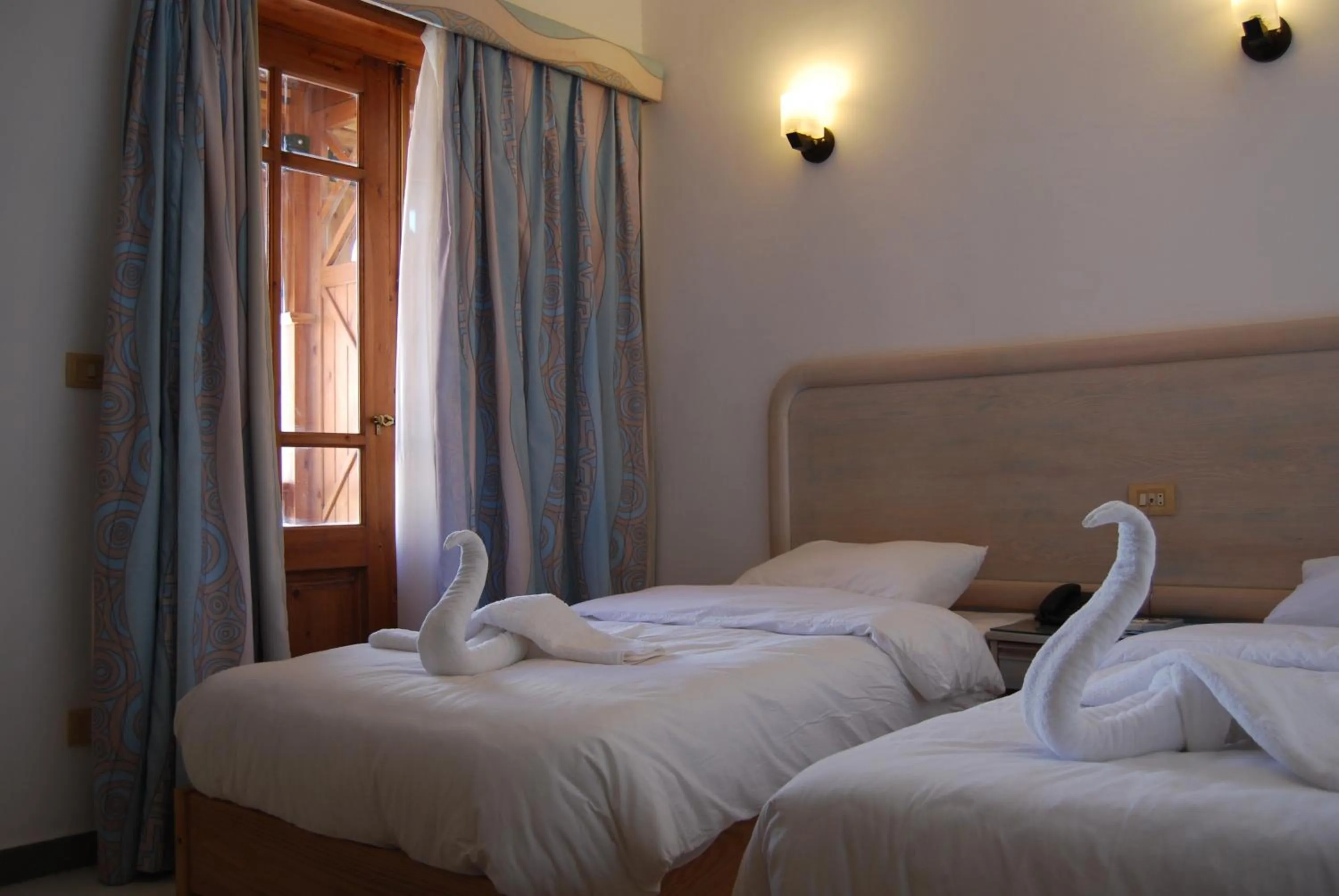 Bed in Acacia Dahab Hotel