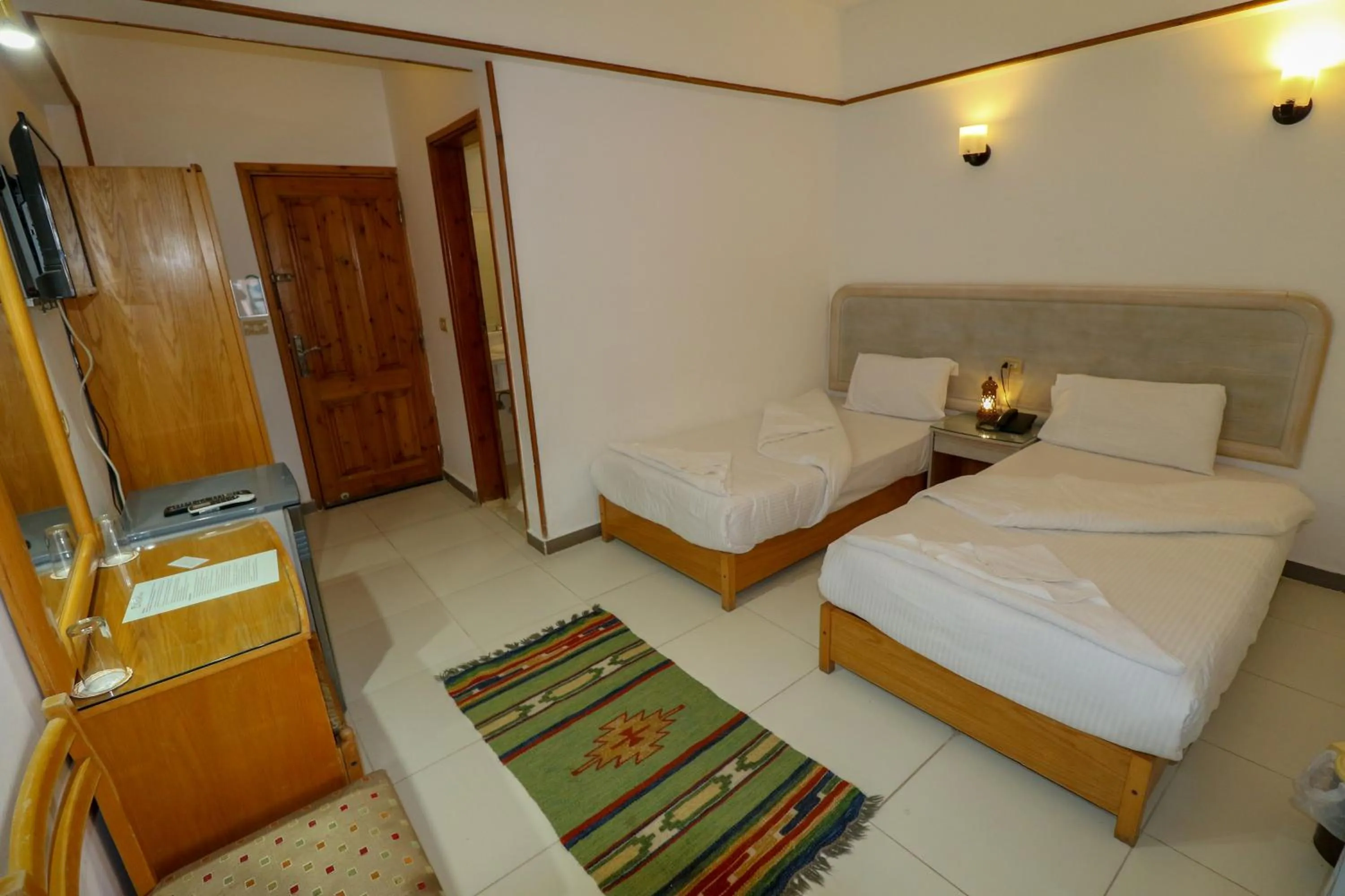 Bed in Acacia Dahab Hotel