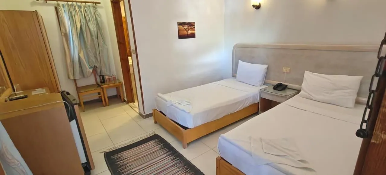 Bed in Acacia Dahab Hotel