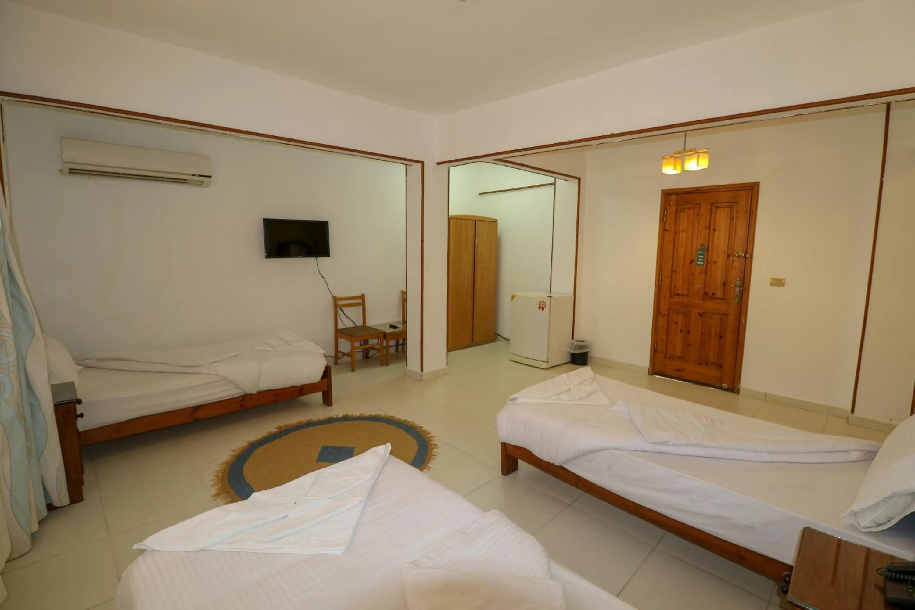 Bed in Acacia Dahab Hotel