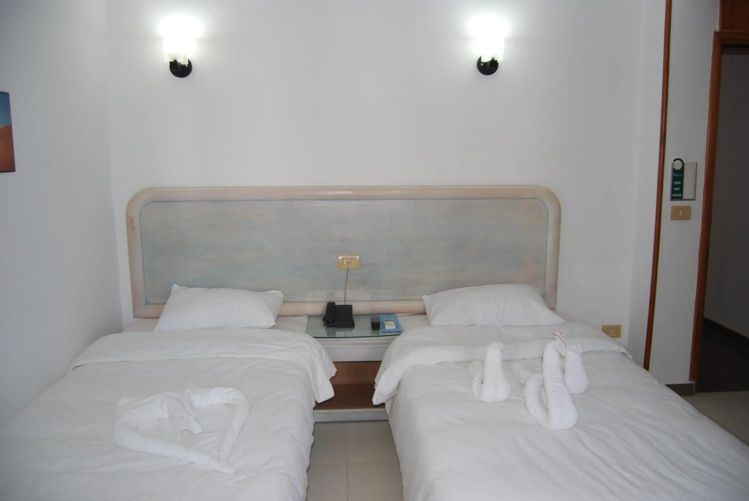 Bed in Acacia Dahab Hotel