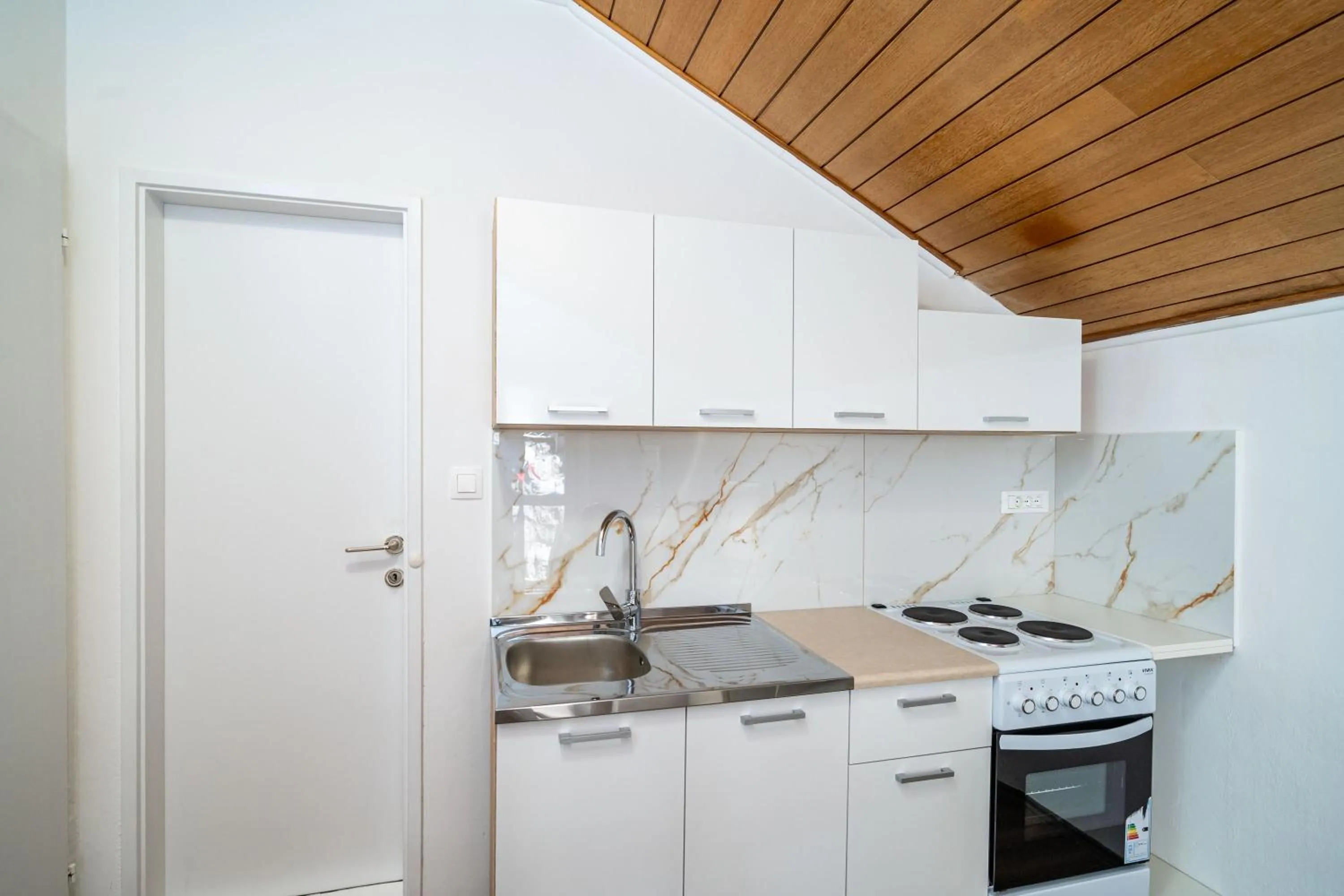 Communal kitchen in Guest House Daniela