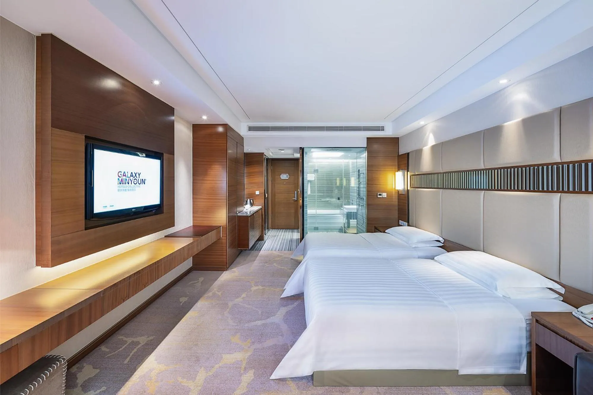 Bed in Galaxy minyoun Chengdu Hotel