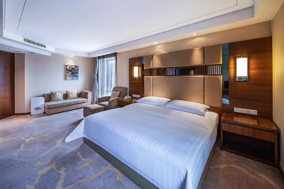 Bed in Galaxy minyoun Chengdu Hotel