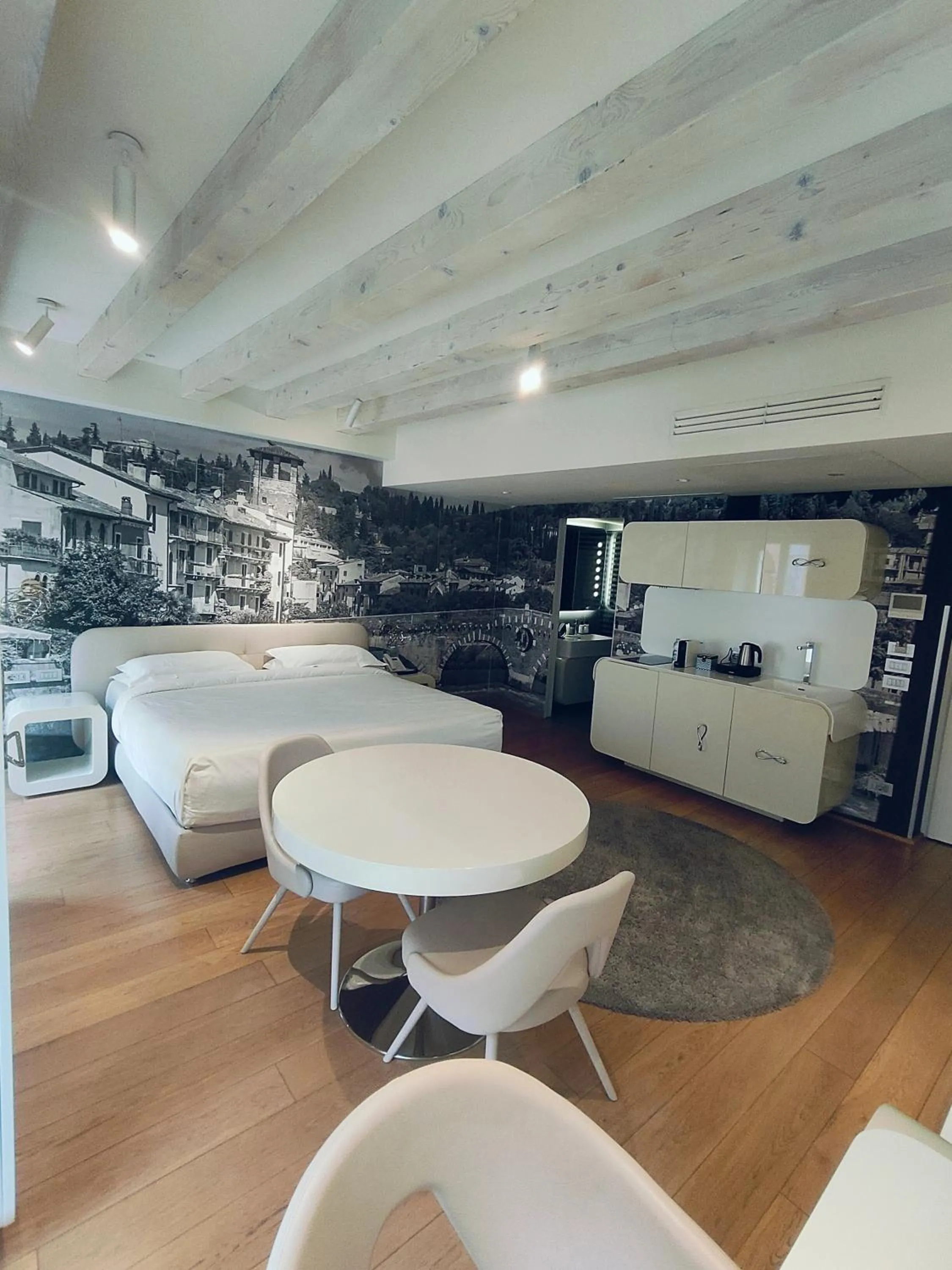 Bed in Lords of Verona Luxury Apartments